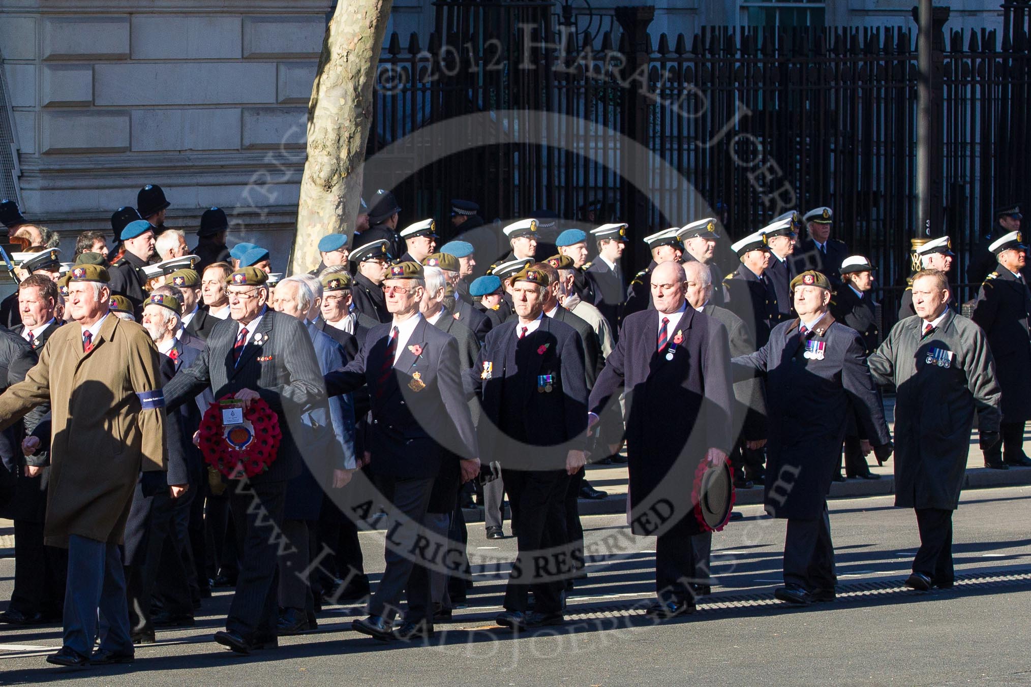 Remembrance Sunday 2012 Cenotaph March Past: Group A25 - Argyll & Sutherland Highlanders Regimental Association and A26 - Grenadier Guards Association..
Whitehall, Cenotaph,
London SW1,

United Kingdom,
on 11 November 2012 at 11:52, image #743