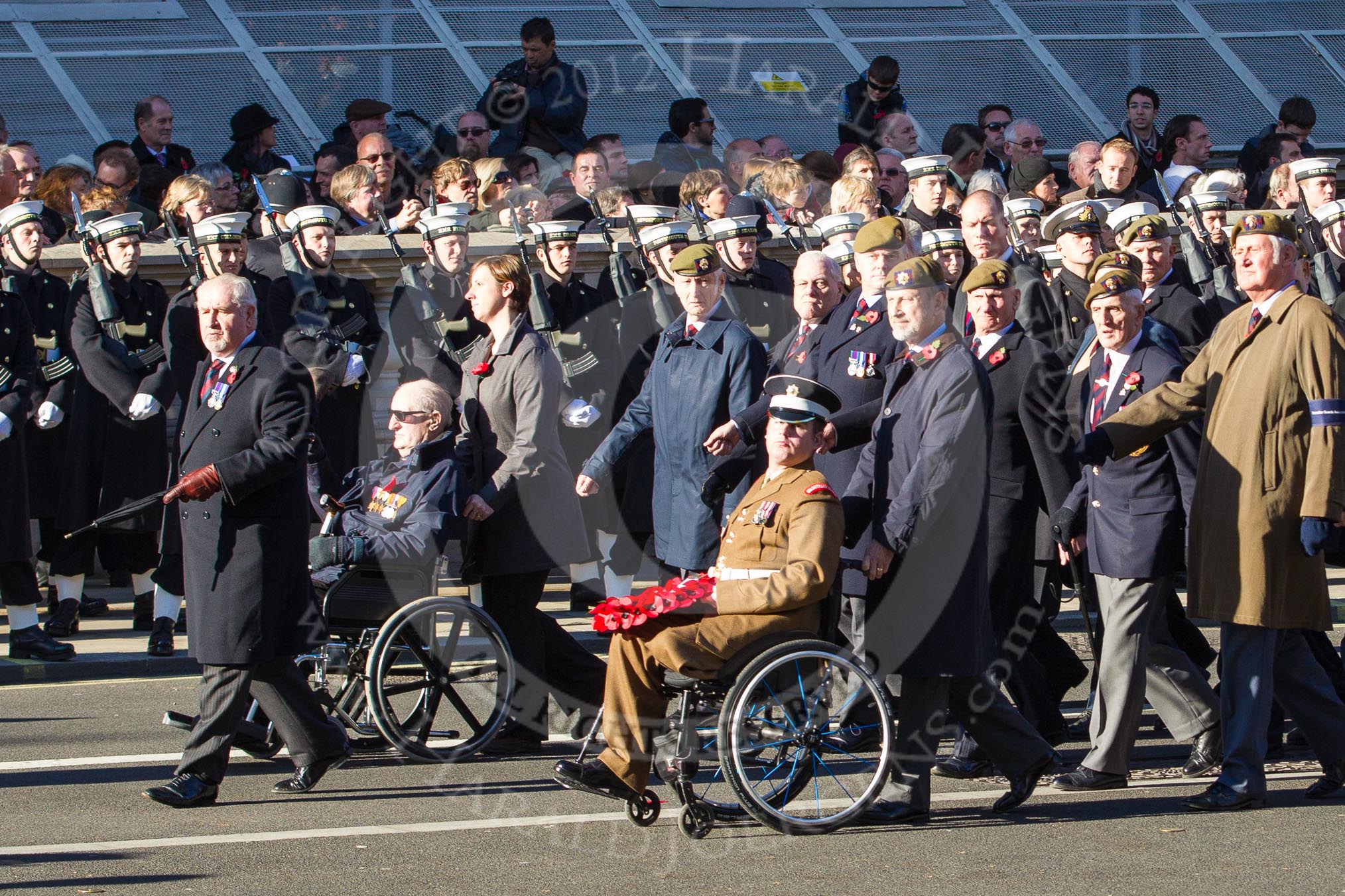 Remembrance Sunday 2012 Cenotaph March Past: Group A25 - Argyll & Sutherland Highlanders Regimental Association and A26 - Grenadier Guards Association..
Whitehall, Cenotaph,
London SW1,

United Kingdom,
on 11 November 2012 at 11:52, image #747