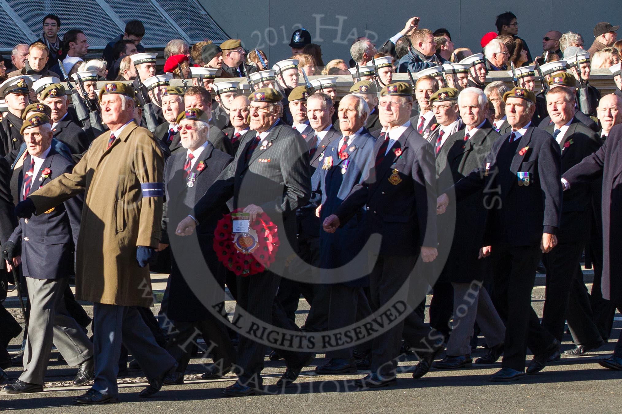 Remembrance Sunday 2012 Cenotaph March Past: Group A25 - Argyll & Sutherland Highlanders Regimental Association and A26 - Grenadier Guards Association..
Whitehall, Cenotaph,
London SW1,

United Kingdom,
on 11 November 2012 at 11:52, image #748