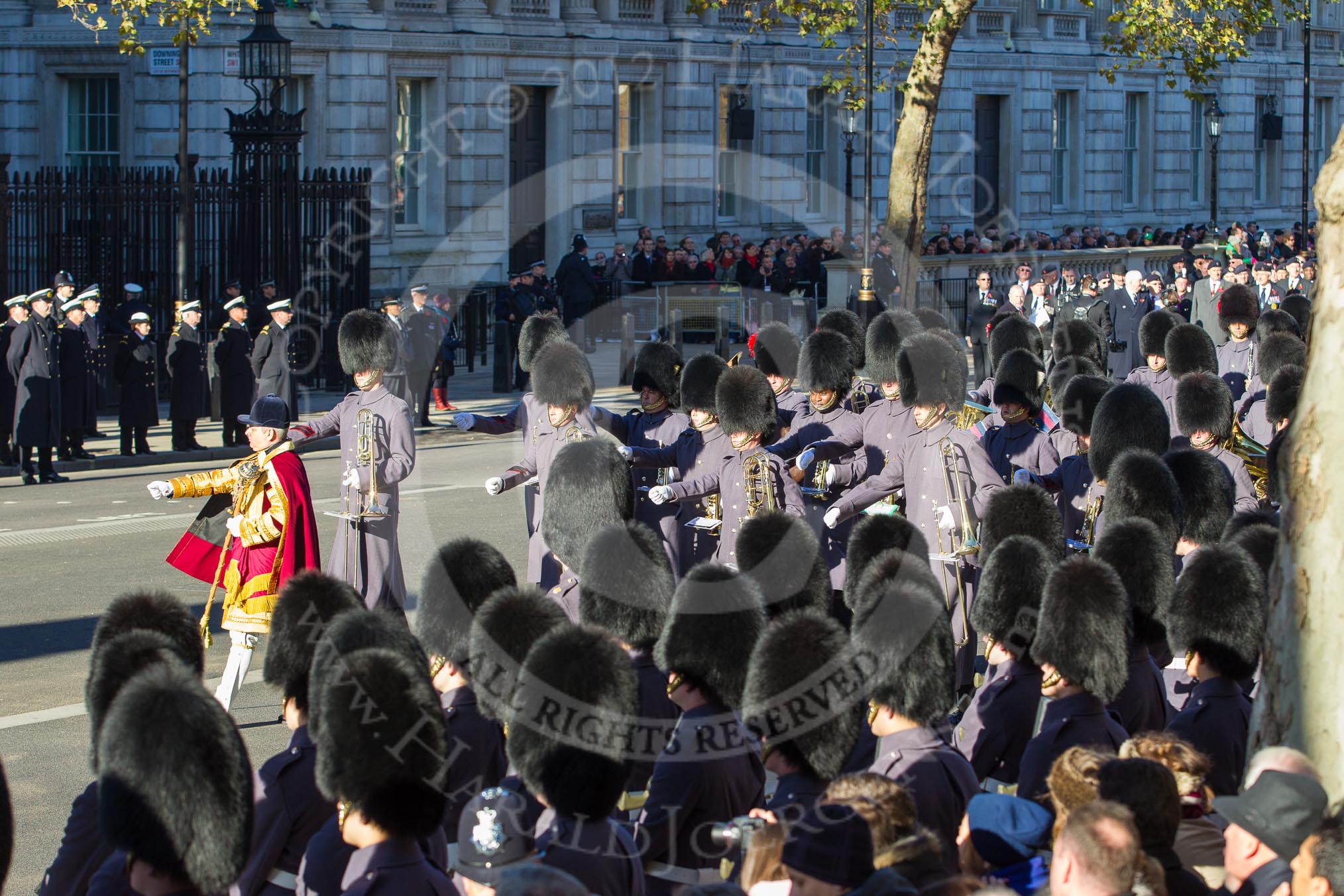 Remembrance Sunday 2012 Cenotaph March Past: One of the Massed Bands, with Drum Major Stephen Staite, Grenadier Guards, in the lead, marches forward..
Whitehall, Cenotaph,
London SW1,

United Kingdom,
on 11 November 2012 at 11:53, image #762