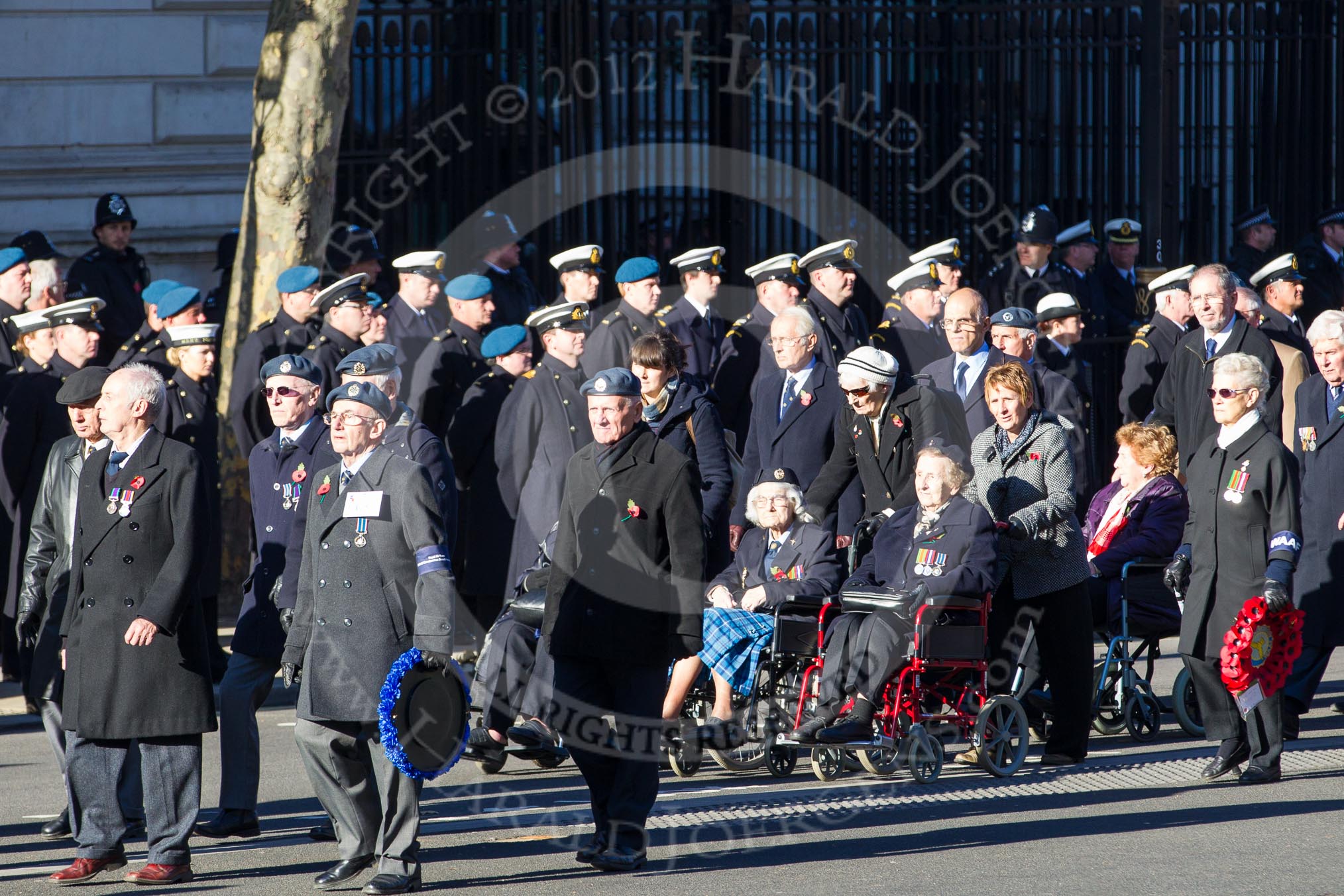 Remembrance Sunday 2012 Cenotaph March Past: Group C5 - Royal Air Force Airfield Construction Branch Association, and C6 - Women's Auxiliary Air Force..
Whitehall, Cenotaph,
London SW1,

United Kingdom,
on 11 November 2012 at 12:01, image #1096