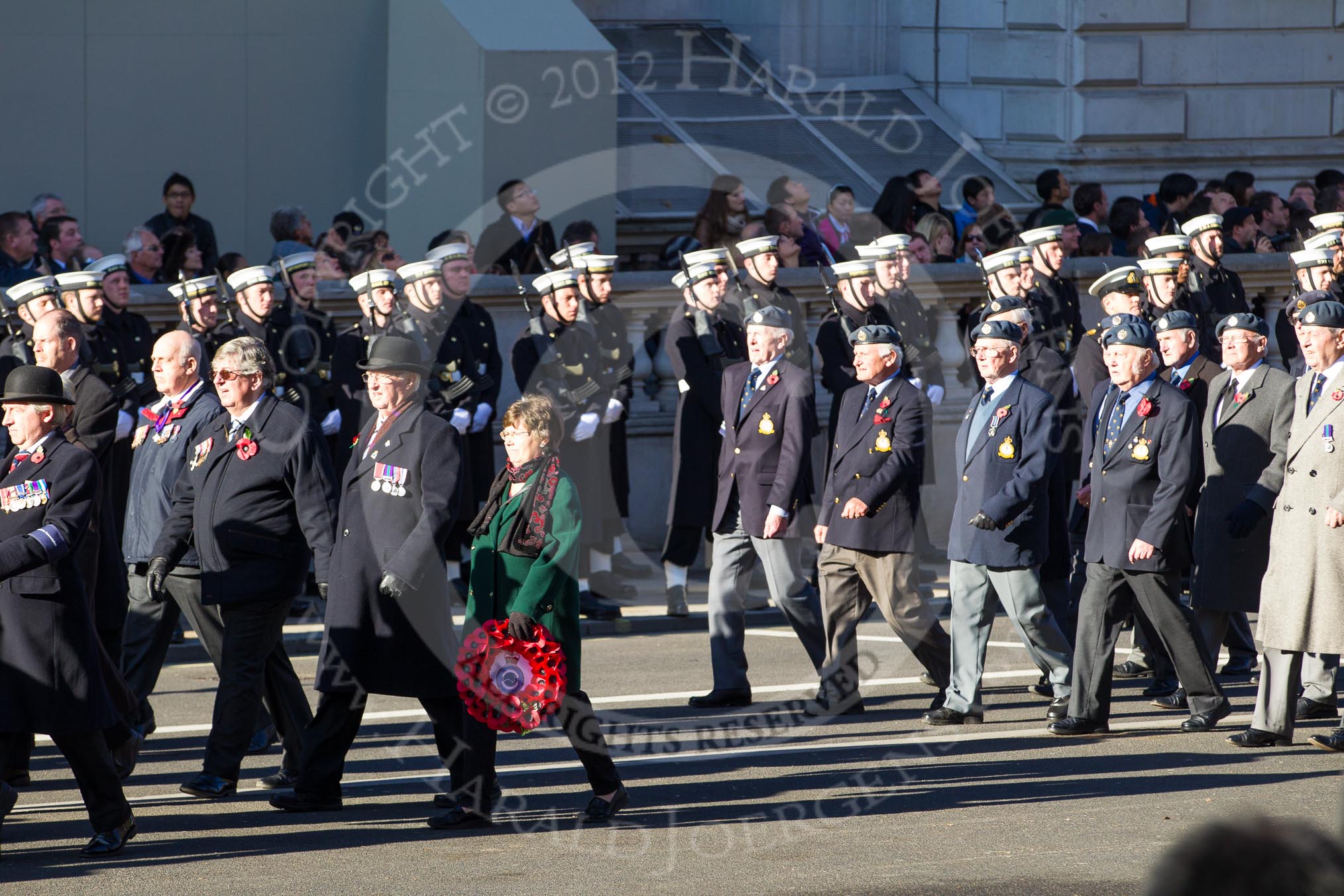 Remembrance Sunday 2012 Cenotaph March Past: Group C19 - 7 Squadron Association and C20 - RAF Habbaniya Association..
Whitehall, Cenotaph,
London SW1,

United Kingdom,
on 11 November 2012 at 12:03, image #1176