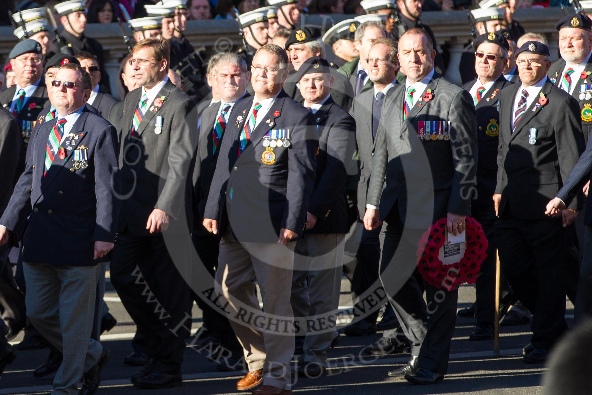 Remembrance Sunday 2012 Cenotaph March Past: Group D1 - South Atlantic Medal Association (www.sama82.org.uk), veterans of the Falklands war in 1982 and islanders from that time..
Whitehall, Cenotaph,
London SW1,

United Kingdom,
on 11 November 2012 at 12:04, image #1210