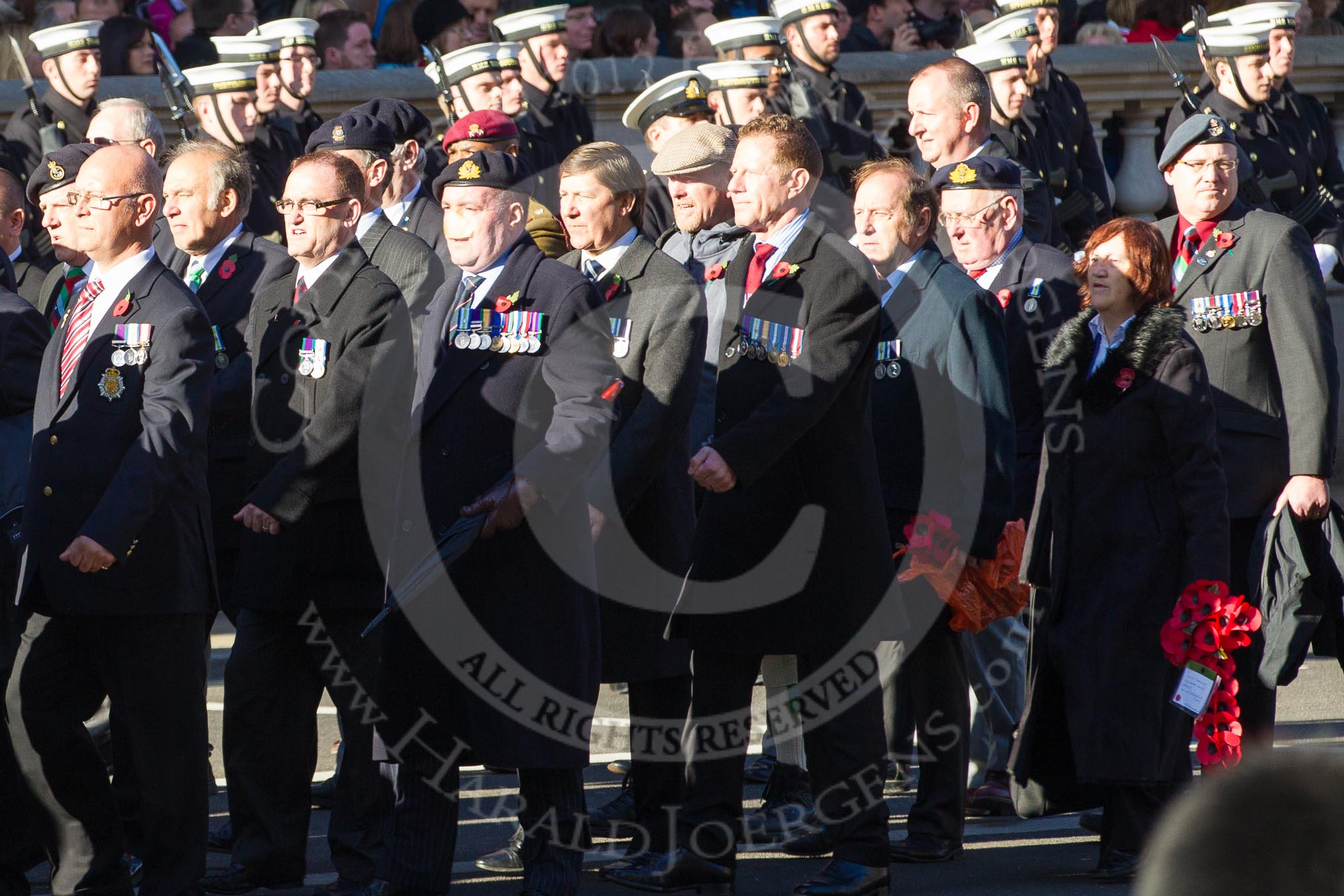 Remembrance Sunday 2012 Cenotaph March Past: Group D1 - South Atlantic Medal Association (www.sama82.org.uk), veterans of the Falklands war in 1982 and islanders from that time..
Whitehall, Cenotaph,
London SW1,

United Kingdom,
on 11 November 2012 at 12:05, image #1229