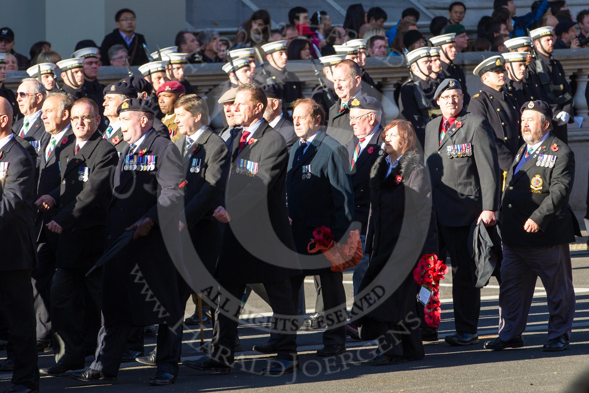 Remembrance Sunday 2012 Cenotaph March Past: Group D1 - South Atlantic Medal Association (www.sama82.org.uk), veterans of the Falklands war in 1982 and islanders from that time..
Whitehall, Cenotaph,
London SW1,

United Kingdom,
on 11 November 2012 at 12:05, image #1231