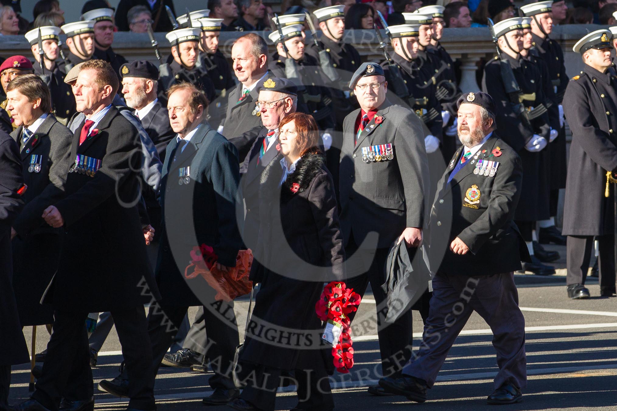 Remembrance Sunday 2012 Cenotaph March Past: Group D1 - South Atlantic Medal Association (www.sama82.org.uk), veterans of the Falklands war in 1982 and islanders from that time..
Whitehall, Cenotaph,
London SW1,

United Kingdom,
on 11 November 2012 at 12:05, image #1232