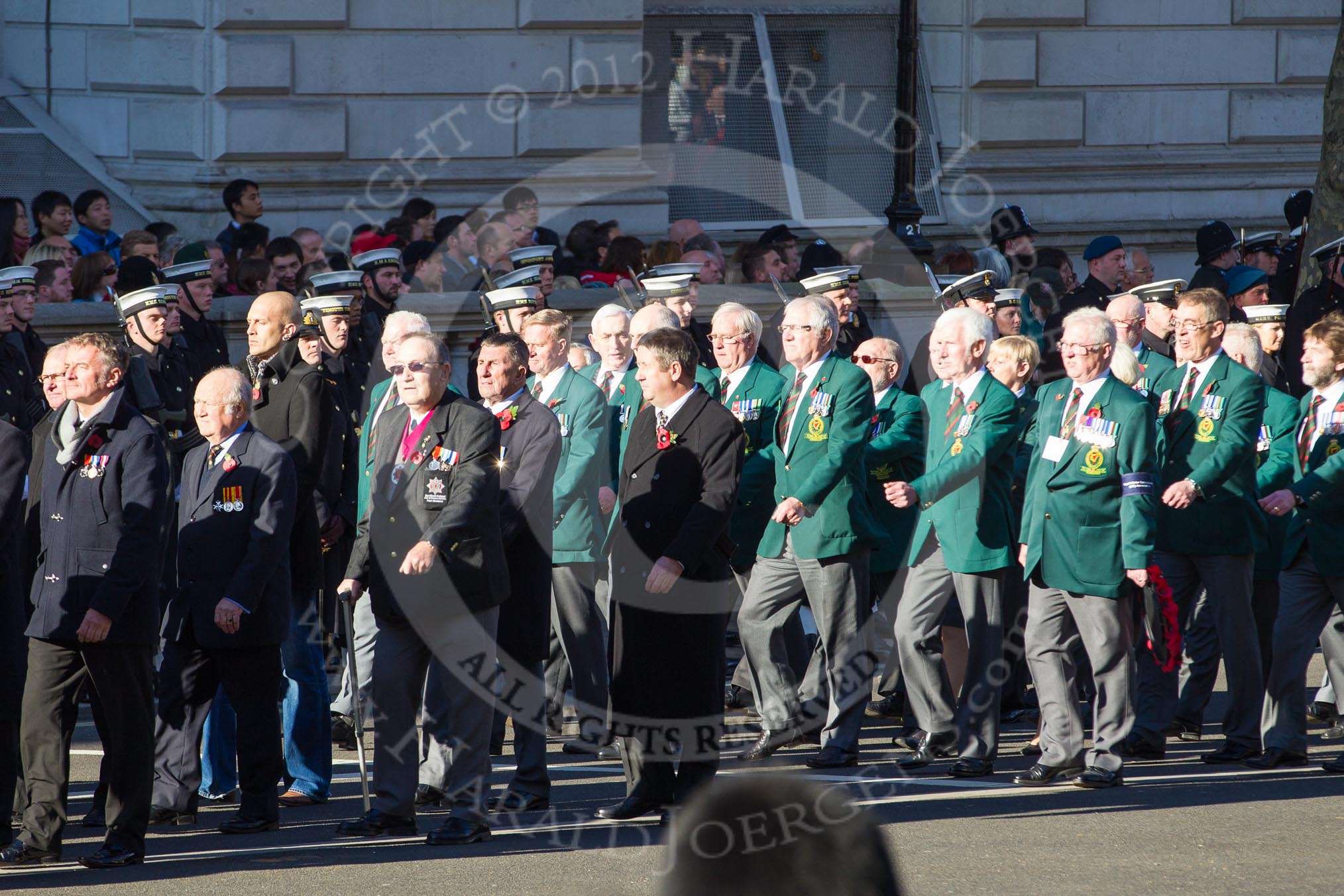 Remembrance Sunday 2012 Cenotaph March Past: Group M18 - Firefighters Memorial Charitable Trust, and M19 - Royal Ulster Constabulary (GC) Association..
Whitehall, Cenotaph,
London SW1,

United Kingdom,
on 11 November 2012 at 12:11, image #1544