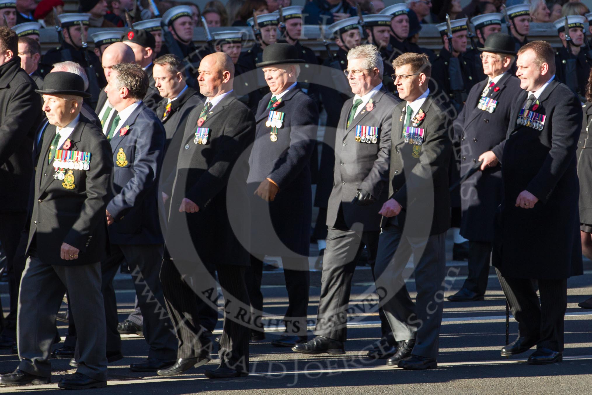 Remembrance Sunday 2012 Cenotaph March Past: Group M20 - Ulster Special Constabulary Association and M21 - Commonwealth War Graves Commission..
Whitehall, Cenotaph,
London SW1,

United Kingdom,
on 11 November 2012 at 12:12, image #1561