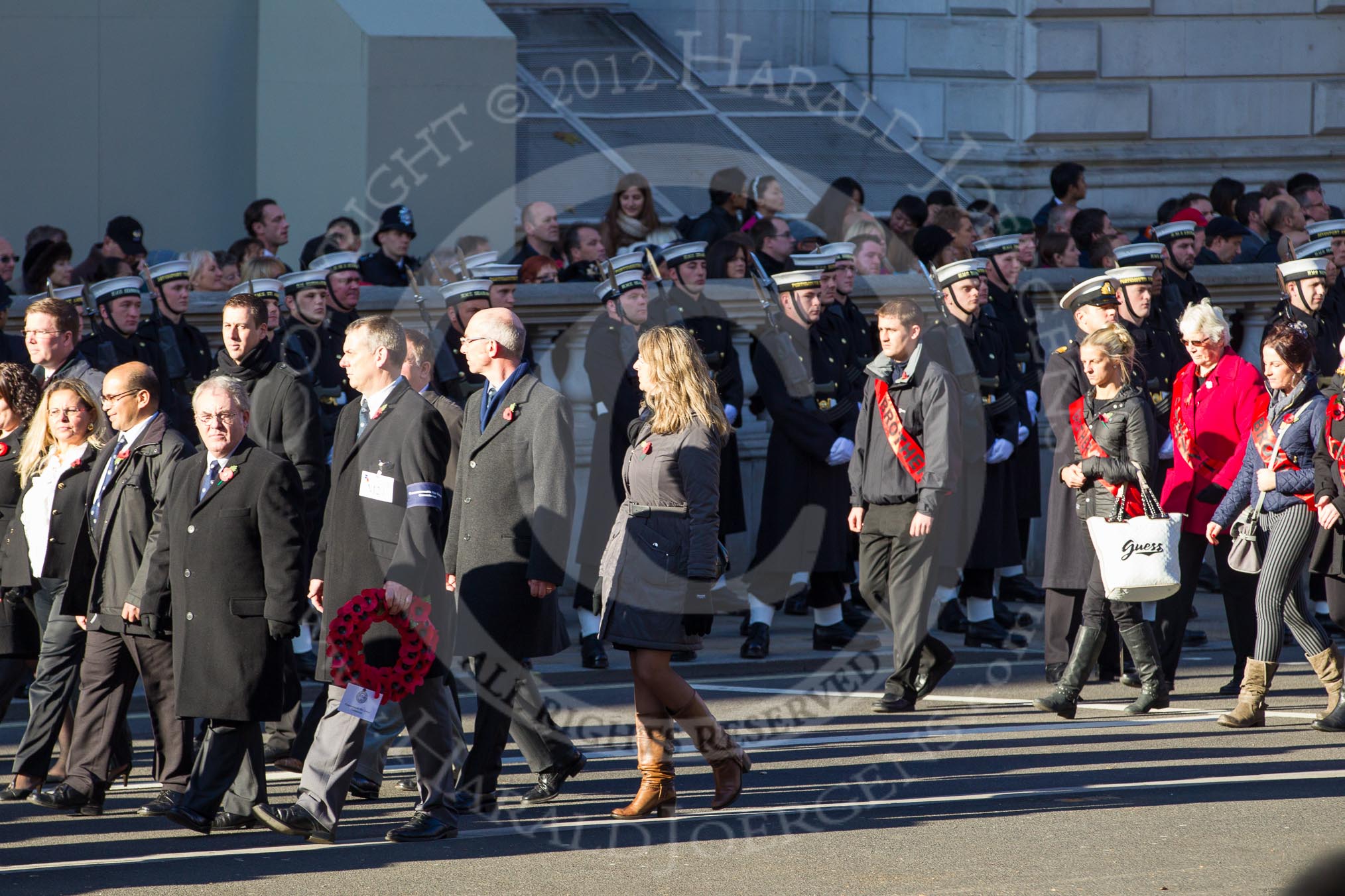 Remembrance Sunday 2012 Cenotaph March Past: Group M21 - Commonwealth War Graves Commission and M22 - Daniel's Trust..
Whitehall, Cenotaph,
London SW1,

United Kingdom,
on 11 November 2012 at 12:12, image #1565