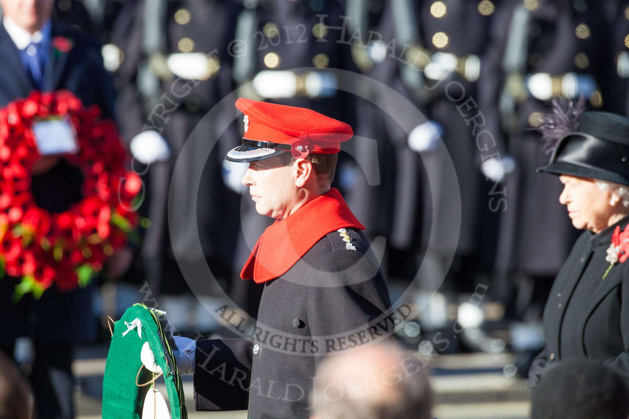 HRH The Earl of Wessex about to lay his wreath at the Cenotaph. Behind him HM The Queen.