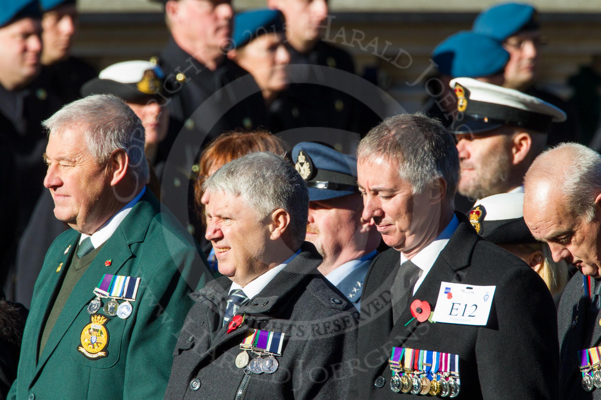 Remembrance Sunday Cenotaph March Past 2013: E12 - Fleet Air Arm Junglie Association..
Press stand opposite the Foreign Office building, Whitehall, London SW1,
London,
Greater London,
United Kingdom,
on 10 November 2013 at 11:45, image #463