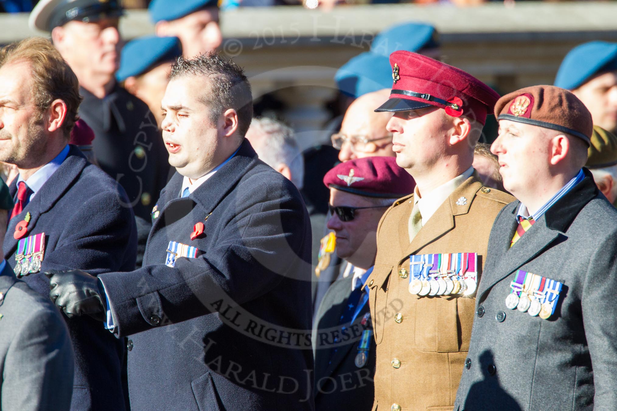 Remembrance Sunday Cenotaph March Past 2013: F22 - Black and White Club..
Press stand opposite the Foreign Office building, Whitehall, London SW1,
London,
Greater London,
United Kingdom,
on 10 November 2013 at 11:53, image #968