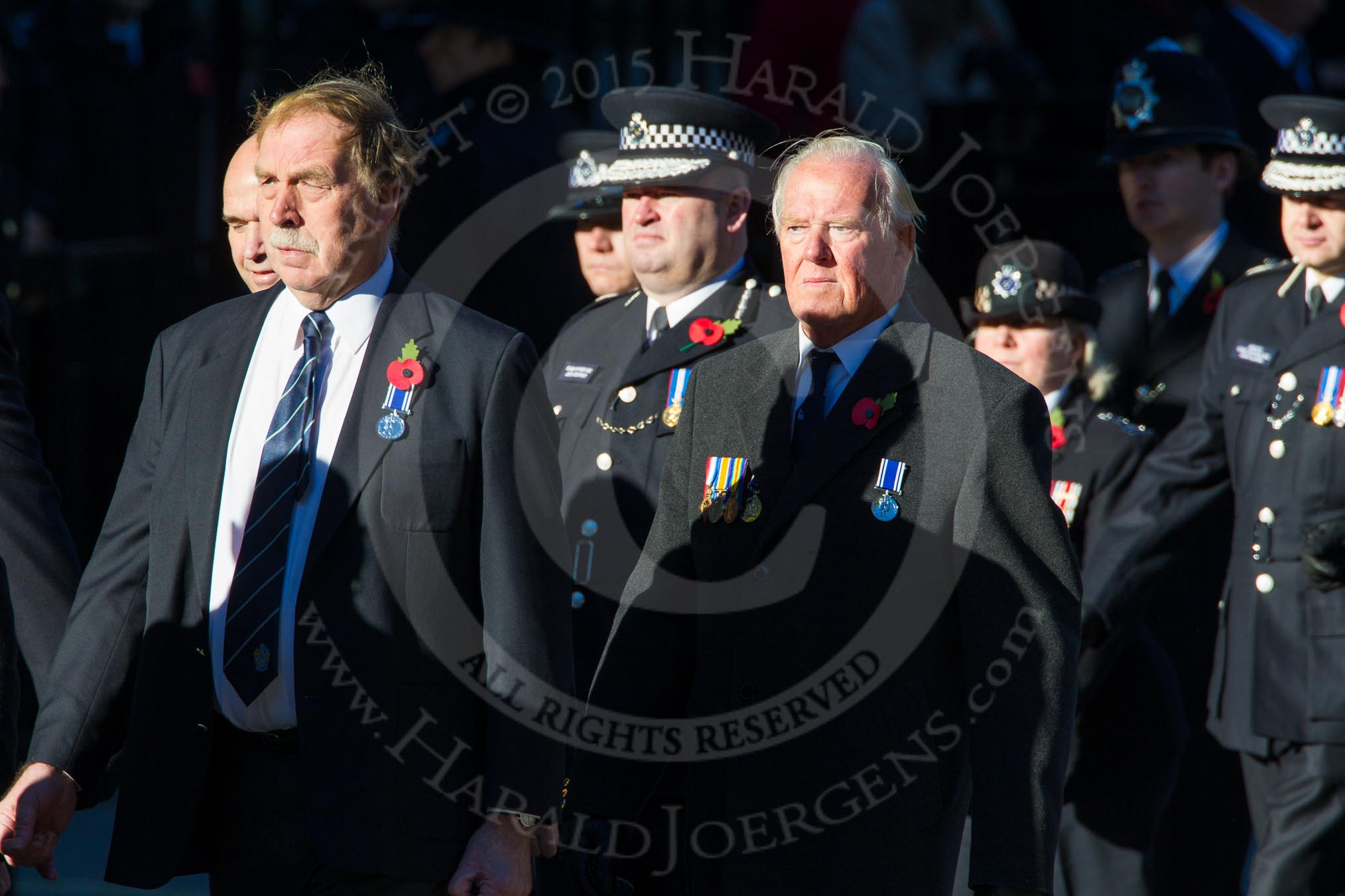 Remembrance Sunday Cenotaph March Past 2013: M13 - Metropolitan Special Constabulary. The Metropolitan Special Constabulary (MSC) is the part-time volunteer police service of the Metropolitan Police Service. On the left, in uniform, is MSC Chief Officer John Conway..
Press stand opposite the Foreign Office building, Whitehall, London SW1,
London,
Greater London,
United Kingdom,
on 10 November 2013 at 12:10, image #1955