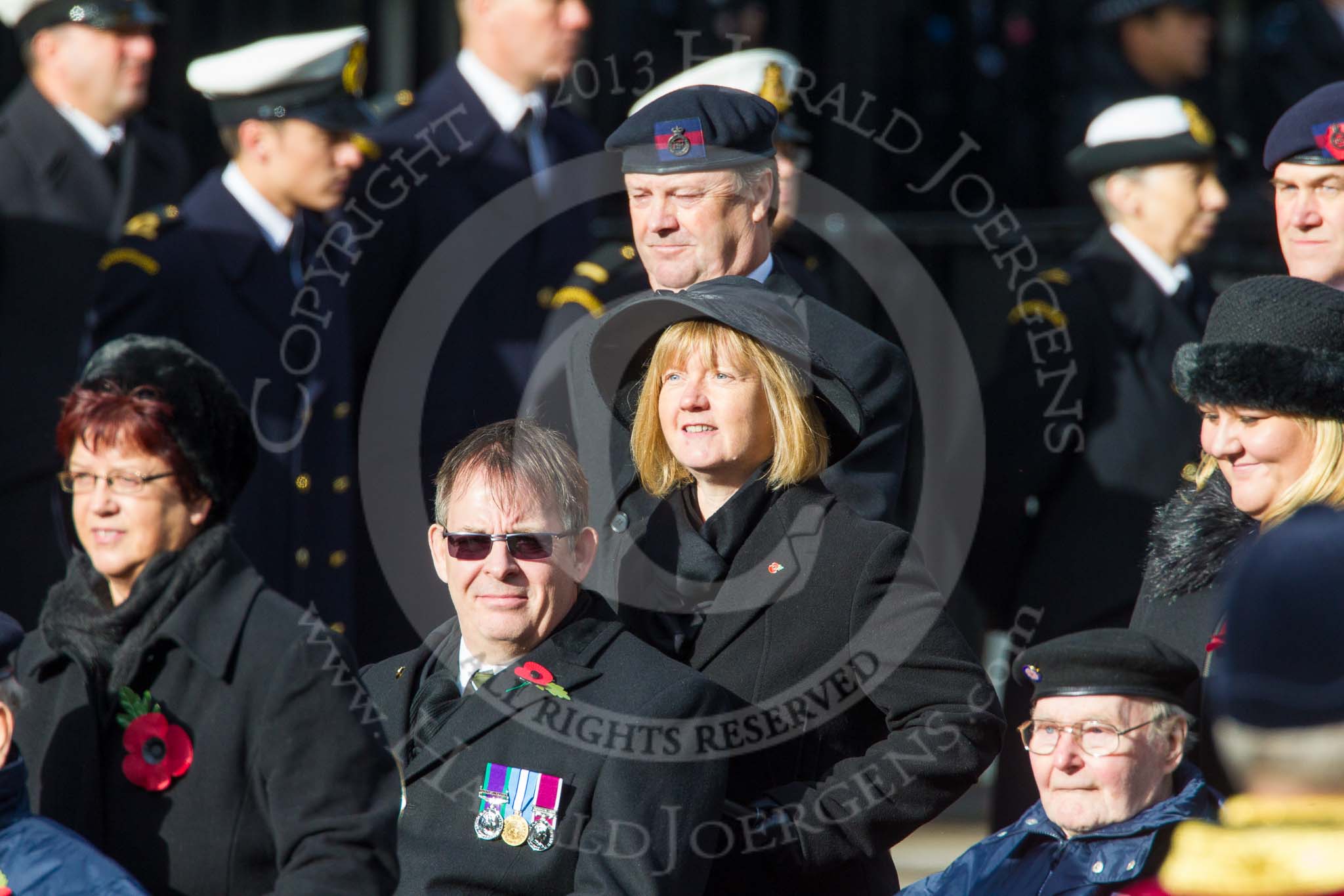 Remembrance Sunday at the Cenotaph in London 2014: Group C27 - Queen Alexandra's Hospital Home for Disabled Ex-
Servicemen & Women.
Press stand opposite the Foreign Office building, Whitehall, London SW1,
London,
Greater London,
United Kingdom,
on 09 November 2014 at 11:42, image #250