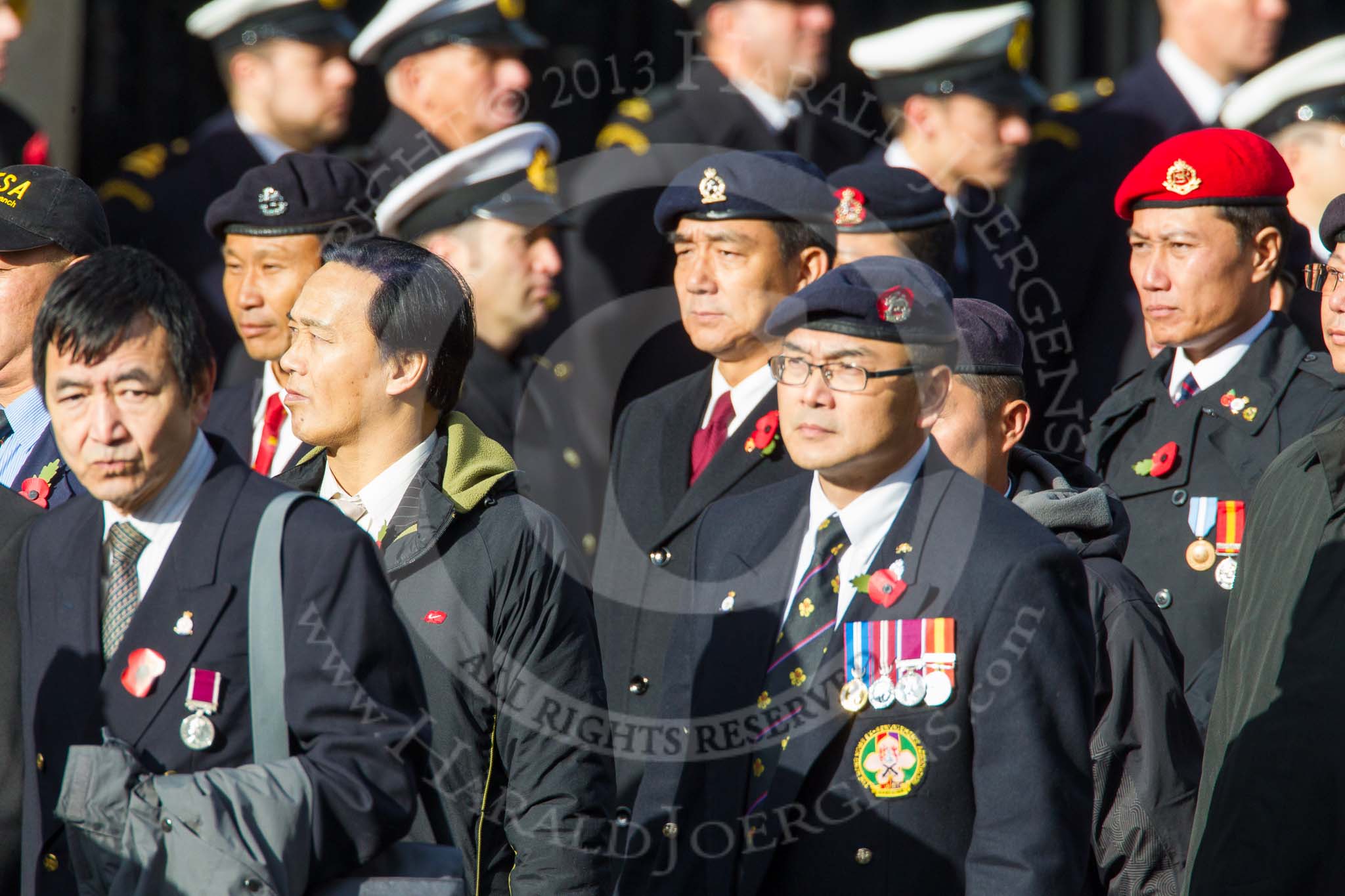 Remembrance Sunday at the Cenotaph in London 2014: Group D2 - Hong Kong Ex-Servicemen's Association (UK Branch).
Press stand opposite the Foreign Office building, Whitehall, London SW1,
London,
Greater London,
United Kingdom,
on 09 November 2014 at 11:43, image #281