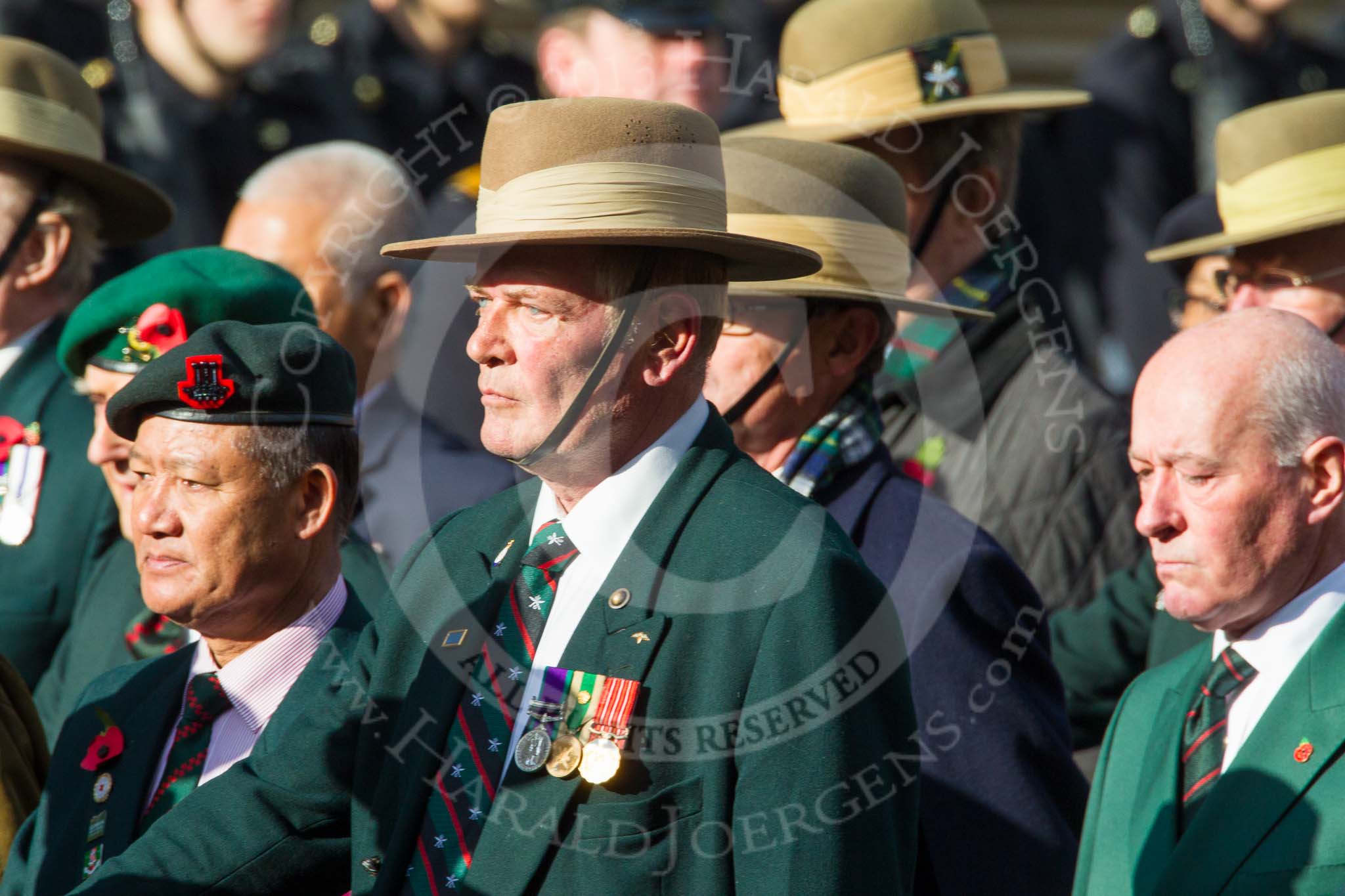 Remembrance Sunday at the Cenotaph in London 2014: Group D25 - Gurkha Brigade Association.
Press stand opposite the Foreign Office building, Whitehall, London SW1,
London,
Greater London,
United Kingdom,
on 09 November 2014 at 11:47, image #466