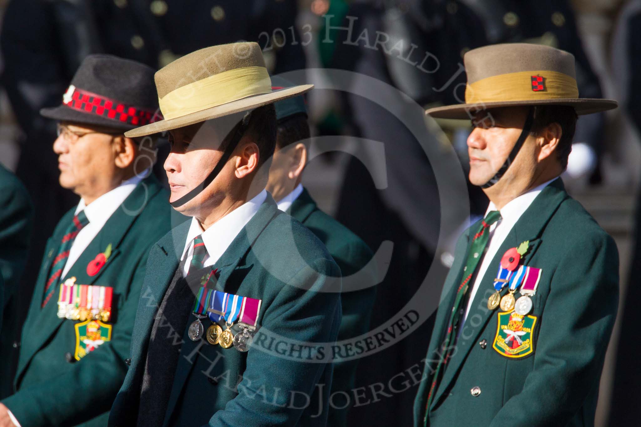 Remembrance Sunday at the Cenotaph in London 2014: Group D26 - British Gurkha Welfare Society.
Press stand opposite the Foreign Office building, Whitehall, London SW1,
London,
Greater London,
United Kingdom,
on 09 November 2014 at 11:47, image #475