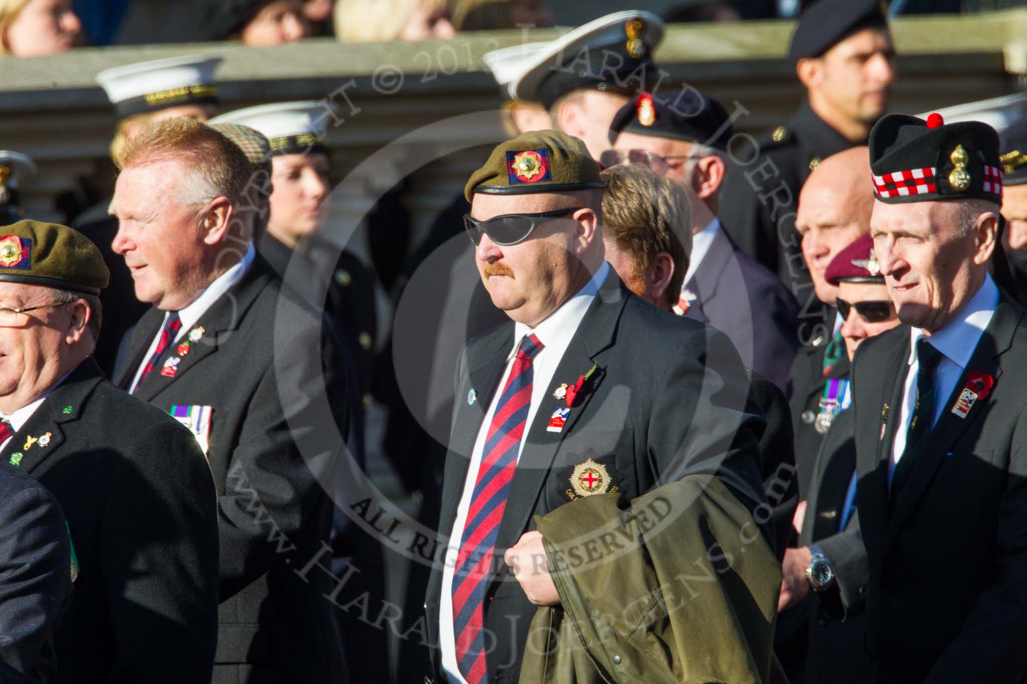 Remembrance Sunday at the Cenotaph in London 2014: ??? Please let me know which group this is! ???.
Press stand opposite the Foreign Office building, Whitehall, London SW1,
London,
Greater London,
United Kingdom,
on 09 November 2014 at 11:55, image #895