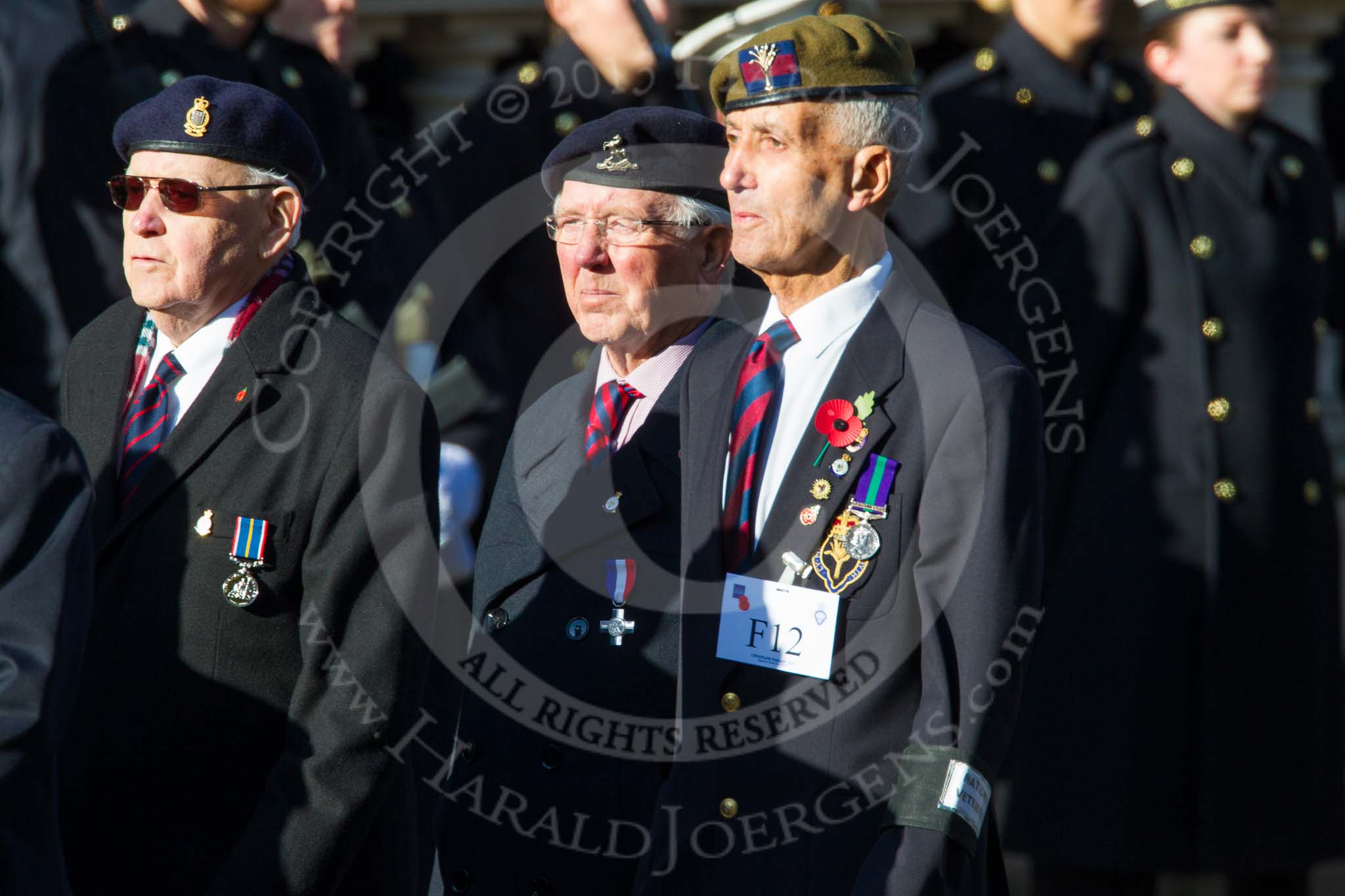 Remembrance Sunday at the Cenotaph in London 2014: Group F12- National Service Veterans Alliance.
Press stand opposite the Foreign Office building, Whitehall, London SW1,
London,
Greater London,
United Kingdom,
on 09 November 2014 at 11:57, image #999