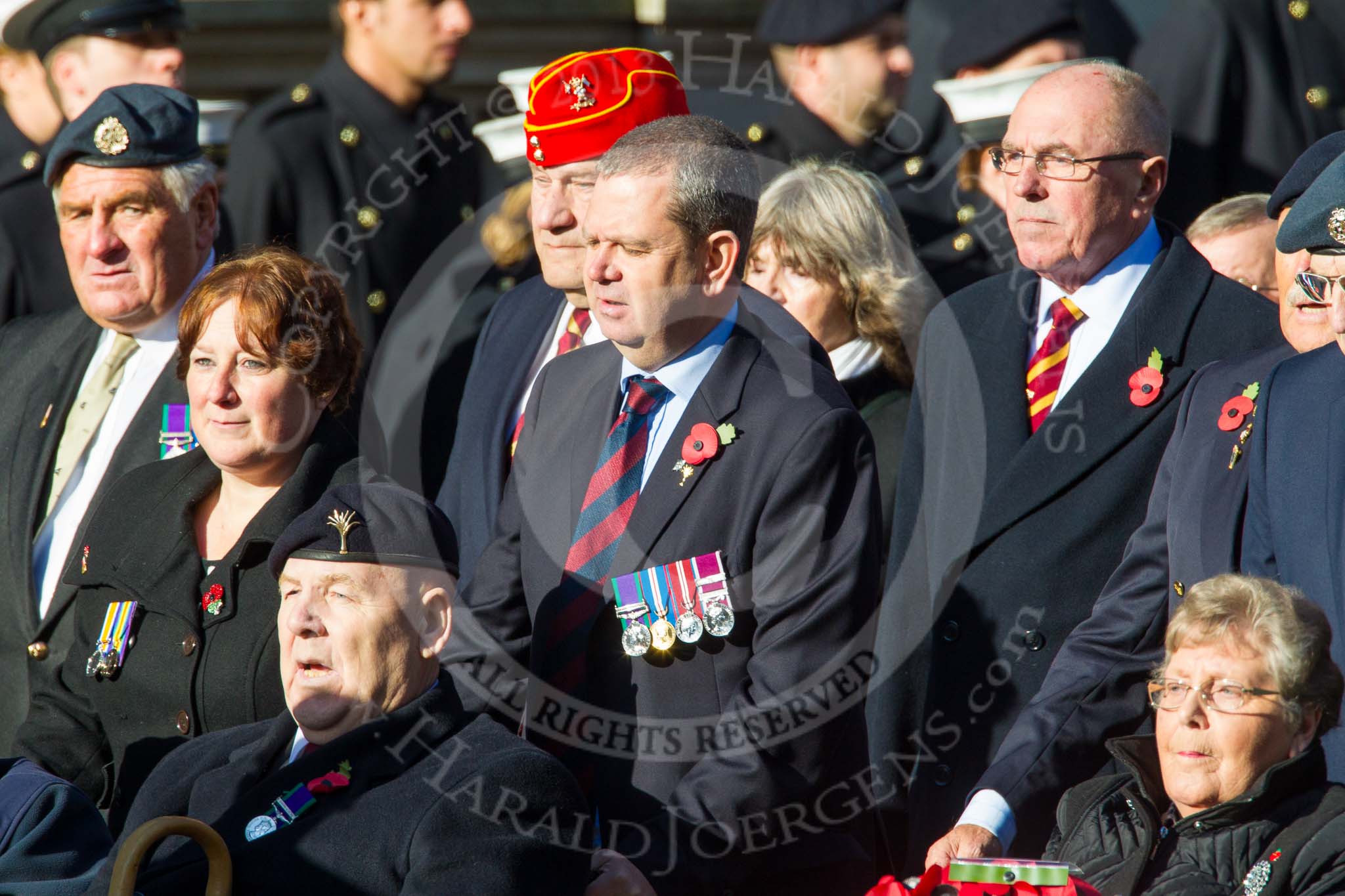 Remembrance Sunday at the Cenotaph in London 2014: Group F18 - Aden Veterans Association.
Press stand opposite the Foreign Office building, Whitehall, London SW1,
London,
Greater London,
United Kingdom,
on 09 November 2014 at 11:59, image #1070