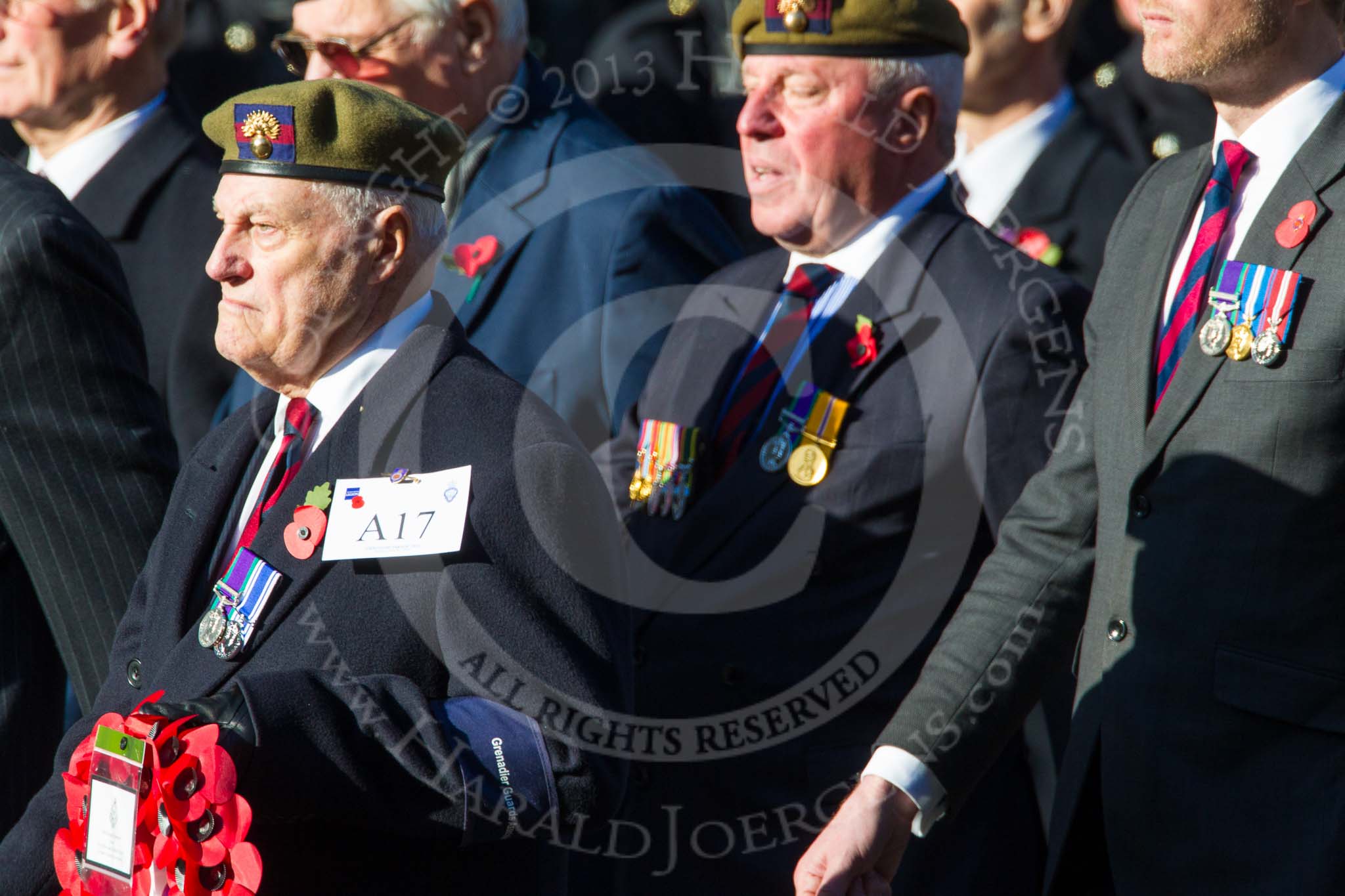 Remembrance Sunday at the Cenotaph in London 2014: Group A17 - Grenadier Guards Association.
Press stand opposite the Foreign Office building, Whitehall, London SW1,
London,
Greater London,
United Kingdom,
on 09 November 2014 at 12:03, image #1312