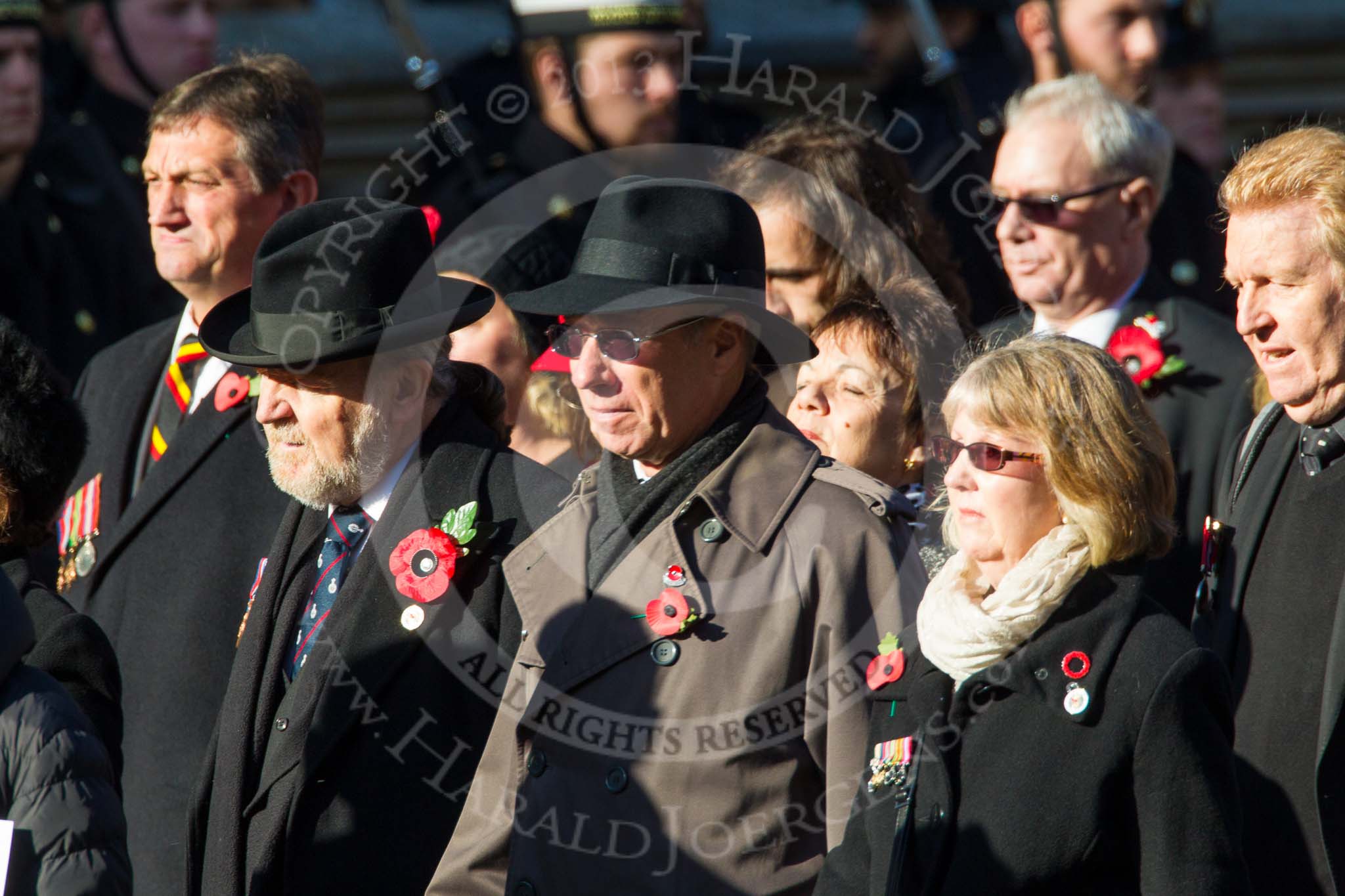 Remembrance Sunday at the Cenotaph in London 2014: Group M4 - Children of the Far East Prisoners of War.
Press stand opposite the Foreign Office building, Whitehall, London SW1,
London,
Greater London,
United Kingdom,
on 09 November 2014 at 12:15, image #1992
