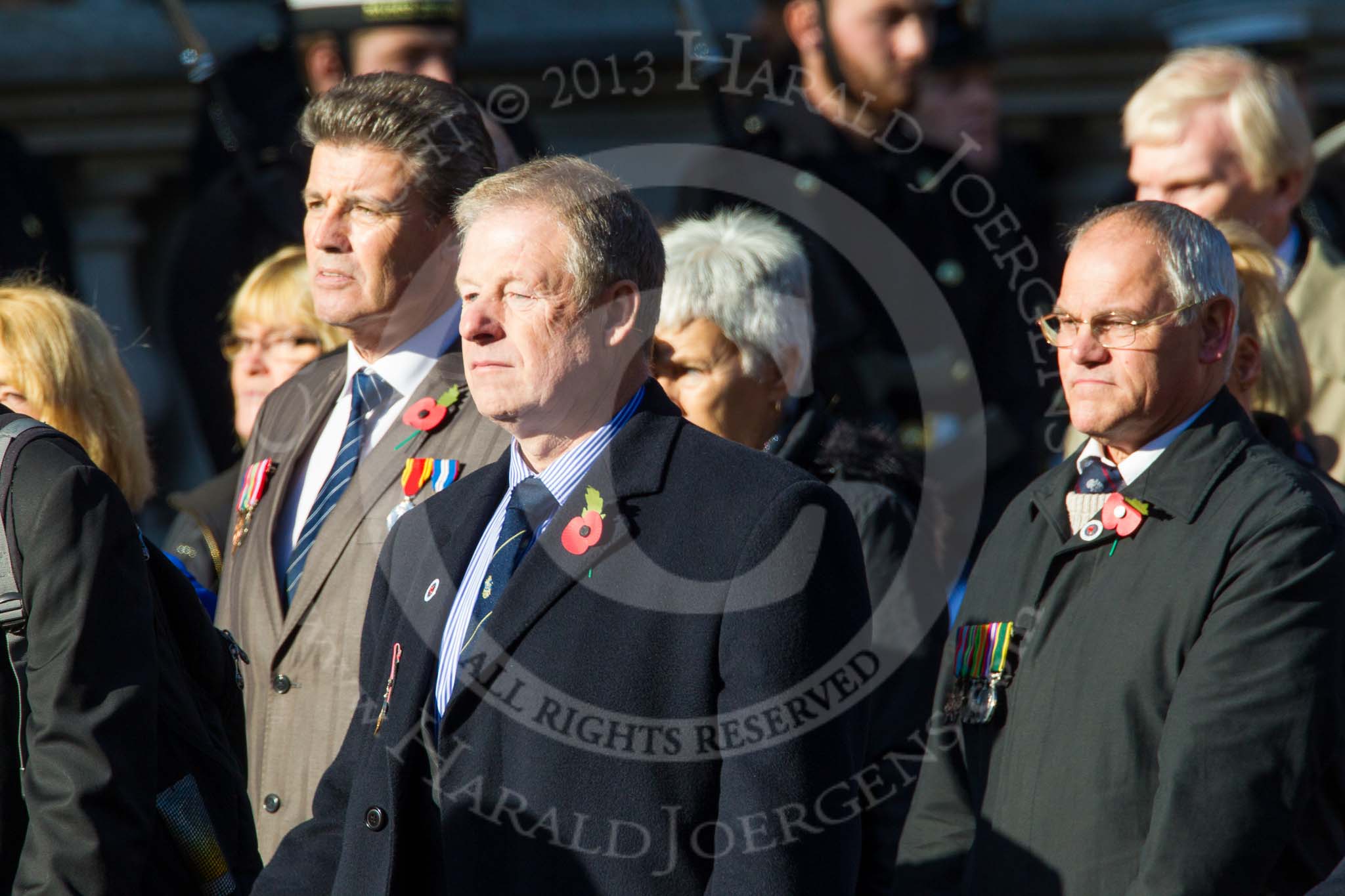 Remembrance Sunday at the Cenotaph in London 2014: Group M4 - Children of the Far East Prisoners of War.
Press stand opposite the Foreign Office building, Whitehall, London SW1,
London,
Greater London,
United Kingdom,
on 09 November 2014 at 12:15, image #1995
