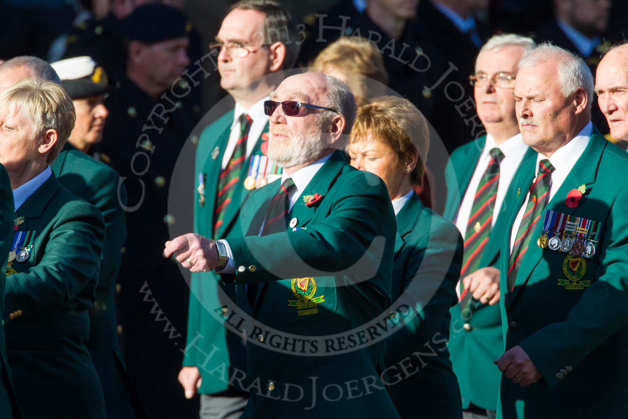 Remembrance Sunday at the Cenotaph in London 2014: Group M19 - Royal Ulster Constabulary (GC) Association.
Press stand opposite the Foreign Office building, Whitehall, London SW1,
London,
Greater London,
United Kingdom,
on 09 November 2014 at 12:17, image #2121