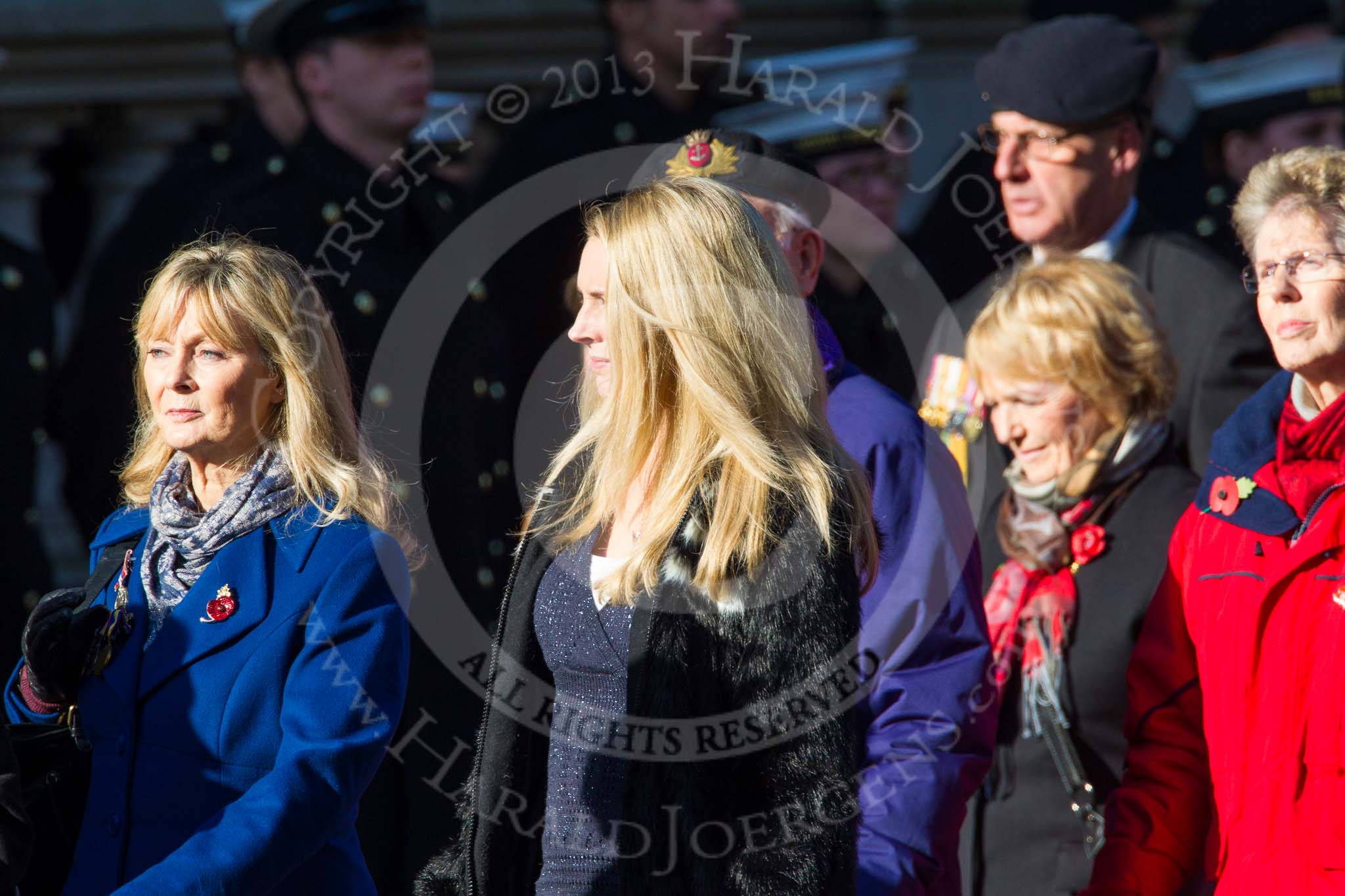 Remembrance Sunday at the Cenotaph in London 2014: Group M23 - Civilians Representing Families.
Press stand opposite the Foreign Office building, Whitehall, London SW1,
London,
Greater London,
United Kingdom,
on 09 November 2014 at 12:18, image #2172