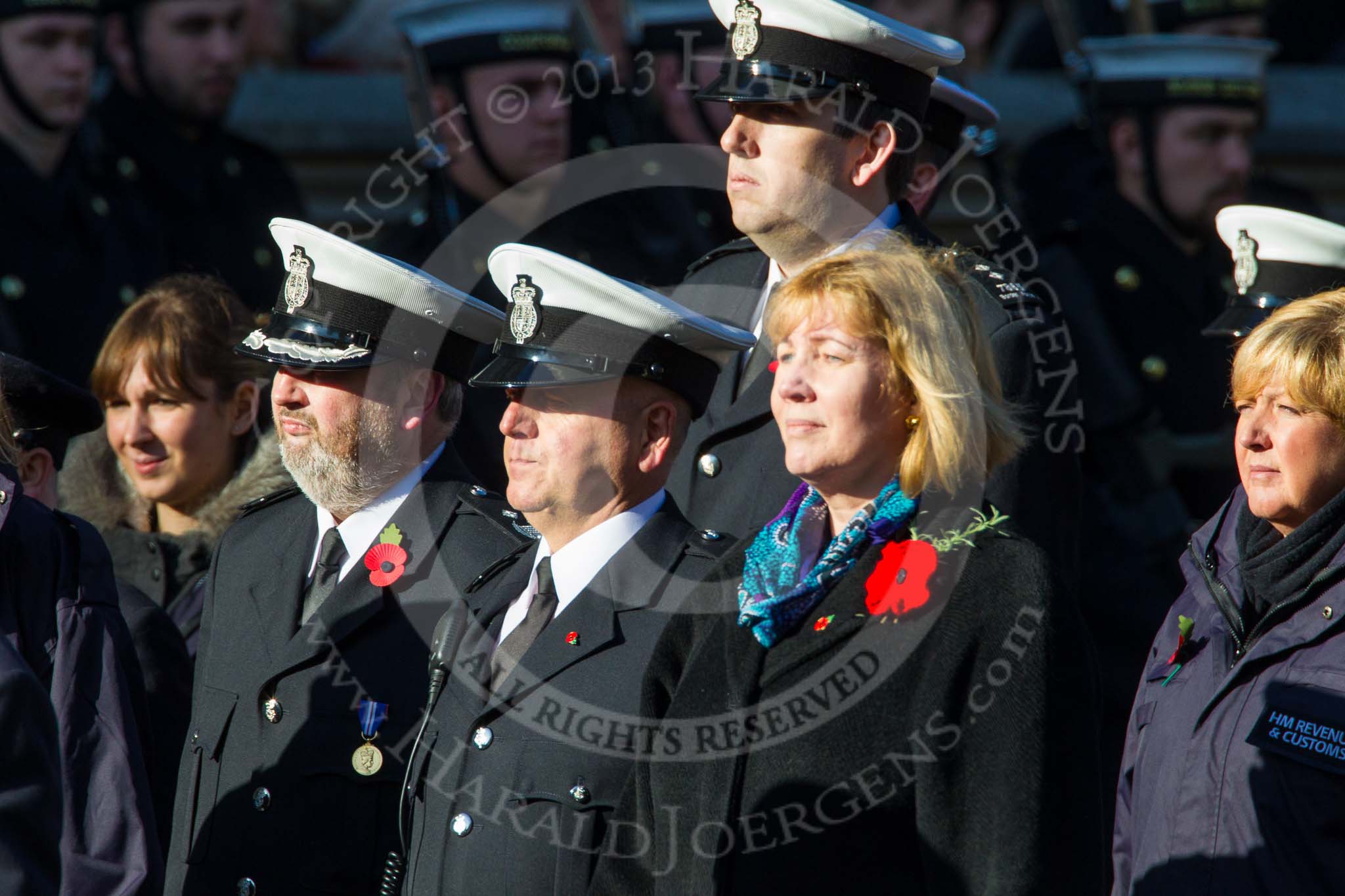 Remembrance Sunday at the Cenotaph in London 2014: Group M?? - HMRC.
Press stand opposite the Foreign Office building, Whitehall, London SW1,
London,
Greater London,
United Kingdom,
on 09 November 2014 at 12:22, image #2378