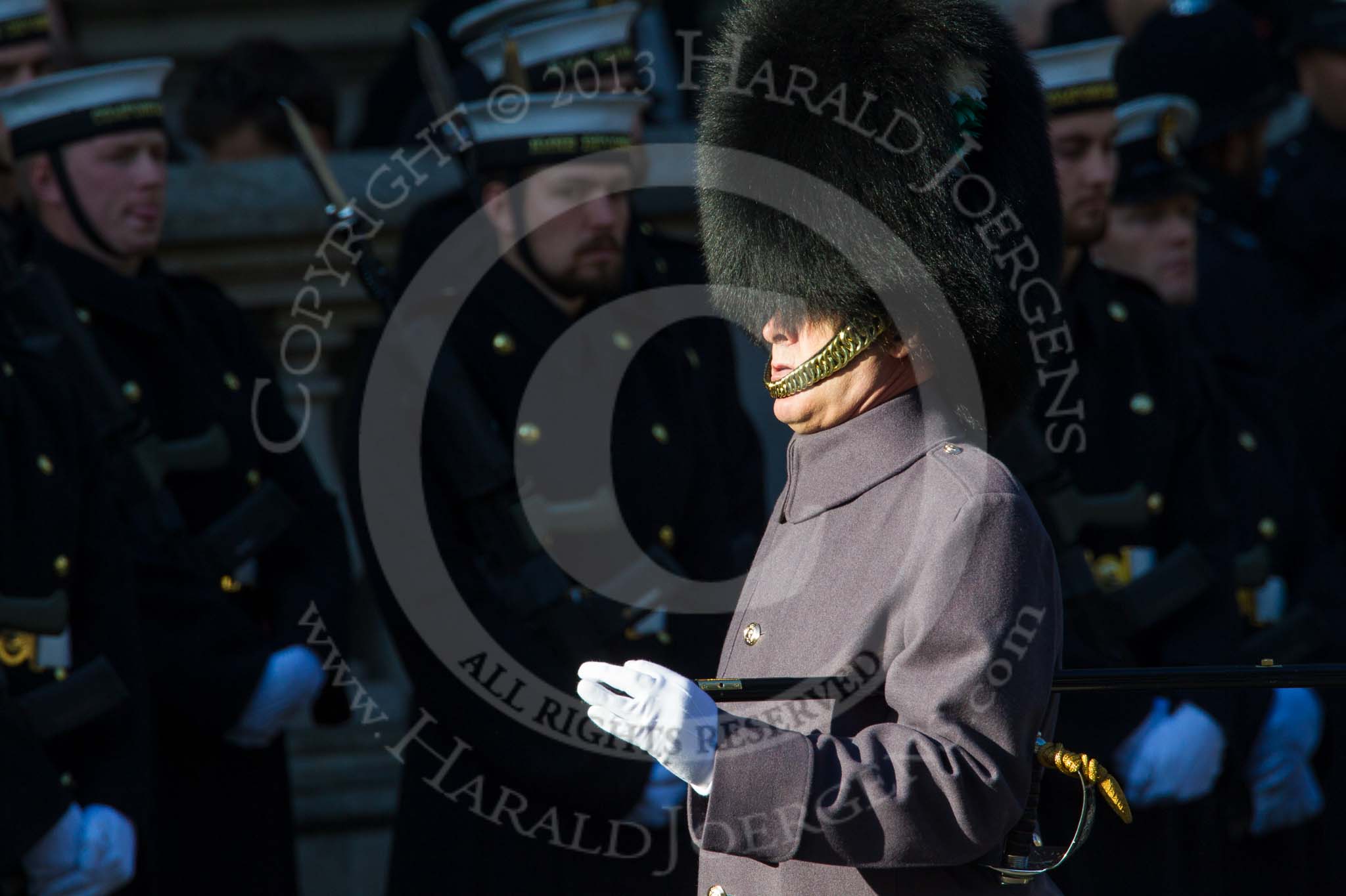 Remembrance Sunday at the Cenotaph in London 2014: Garrison Sergeant Major William Mott, Welsh Guards, following the last group in the March Past.
Press stand opposite the Foreign Office building, Whitehall, London SW1,
London,
Greater London,
United Kingdom,
on 09 November 2014 at 12:23, image #2385