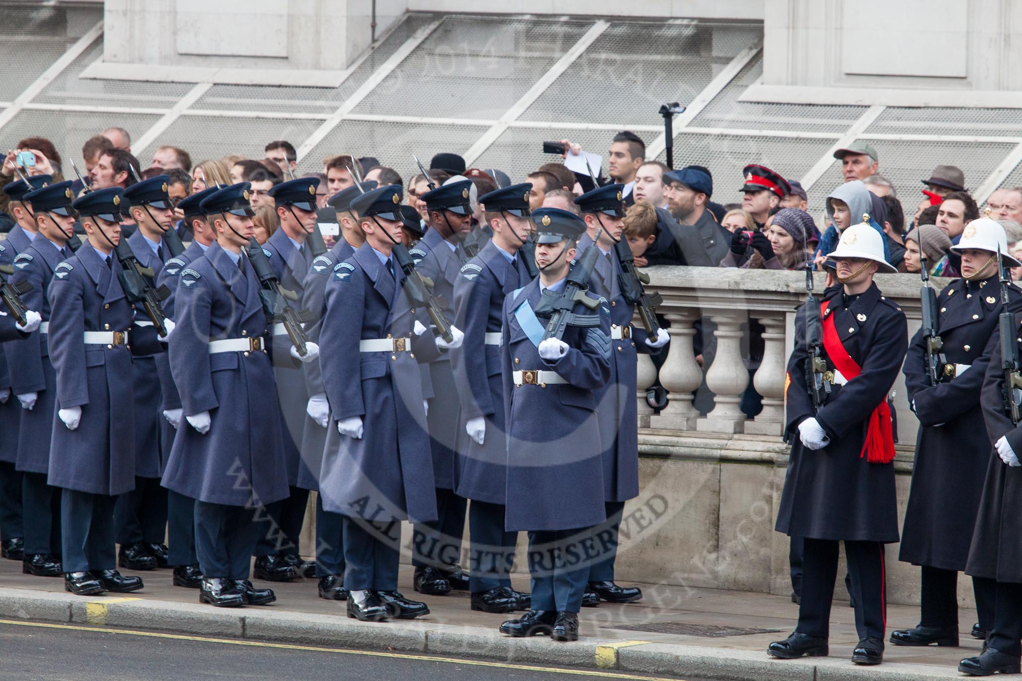 Remembrance Sunday at the Cenotaph in London 2014: The Royal Air Force detachment gets into position on the northern side of Whitehall, next to the Royal Marines detachment.
Press stand opposite the Foreign Office building, Whitehall, London SW1,
London,
Greater London,
United Kingdom,
on 09 November 2014 at 10:34, image #77