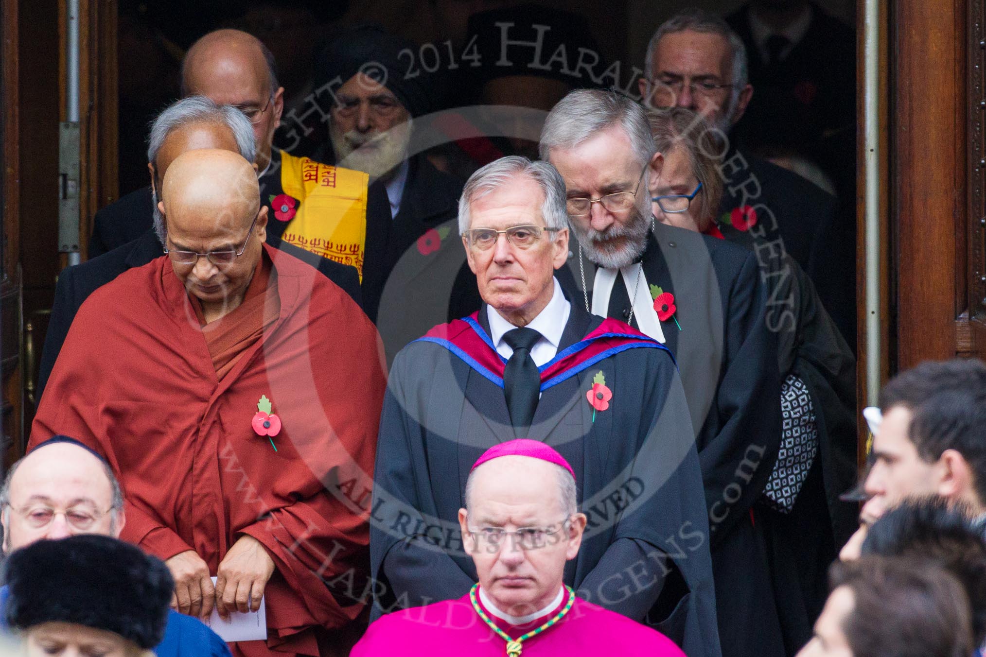 Remembrance Sunday at the Cenotaph in London 2014: The leaders of the faith communities emerging from the door of the Foreign- and Commonwealth Office.
Press stand opposite the Foreign Office building, Whitehall, London SW1,
London,
Greater London,
United Kingdom,
on 09 November 2014 at 10:57, image #138