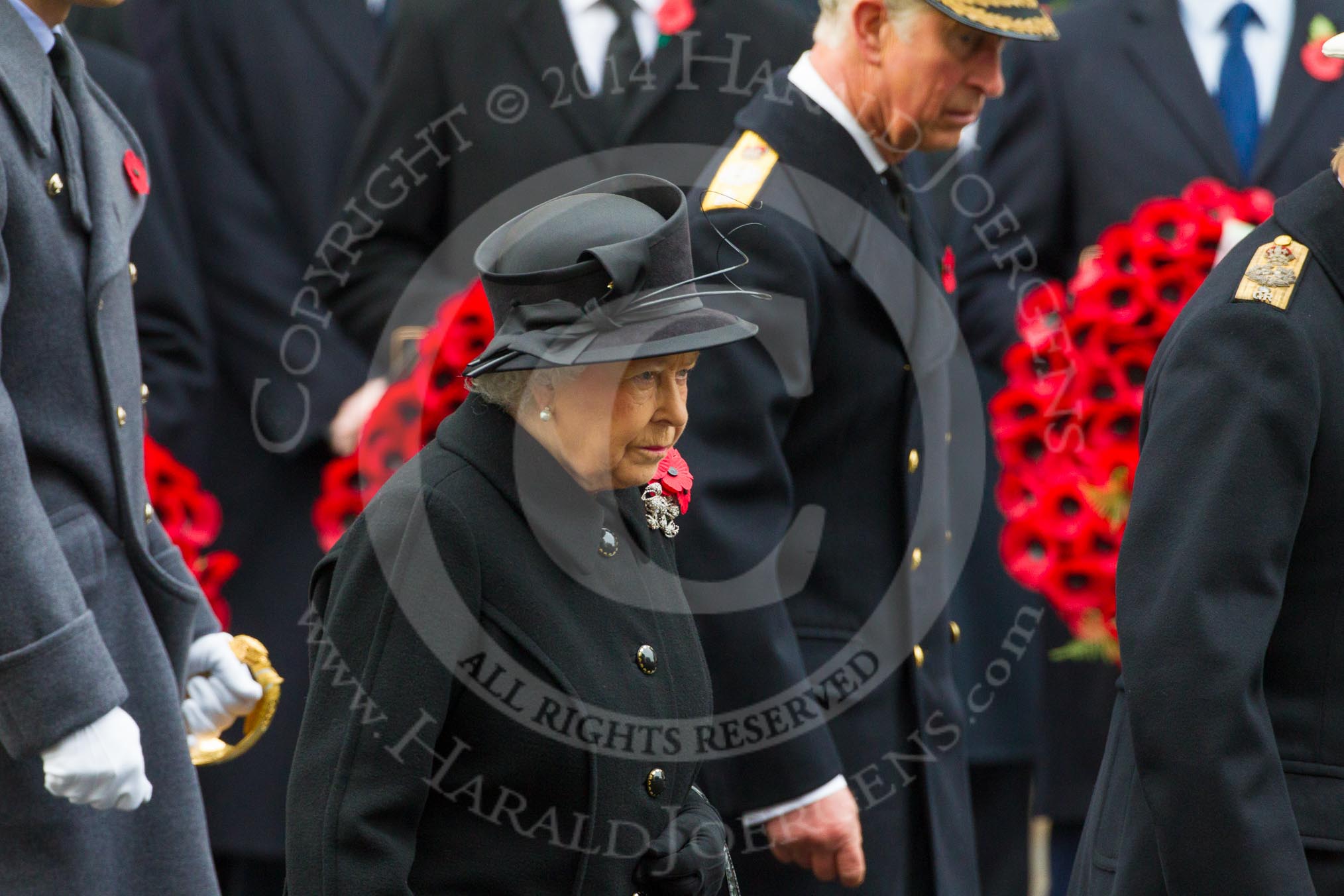 Remembrance Sunday at the Cenotaph in London 2014: HM The Queen, and HRH The Duke walking past the rows of politicians.
Press stand opposite the Foreign Office building, Whitehall, London SW1,
London,
Greater London,
United Kingdom,
on 09 November 2014 at 10:59, image #147