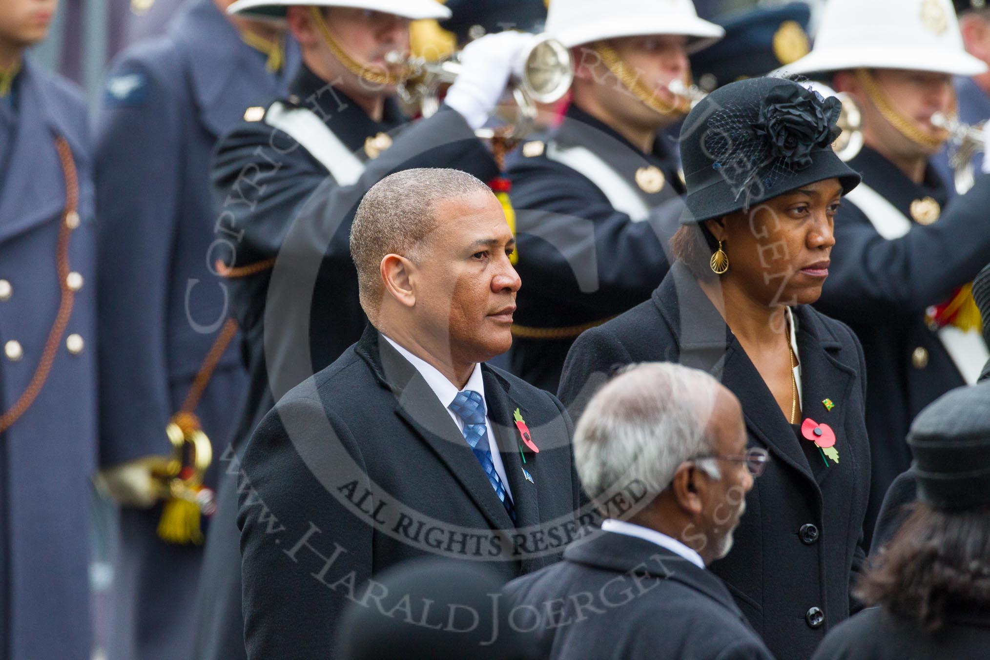 Remembrance Sunday at the Cenotaph in London 2014: The High Commissioner of St Lucia, the High Commissioner of  Commonwealth of Dominica with their wreaths at the Cenotaph.
Press stand opposite the Foreign Office building, Whitehall, London SW1,
London,
Greater London,
United Kingdom,
on 09 November 2014 at 11:03, image #182