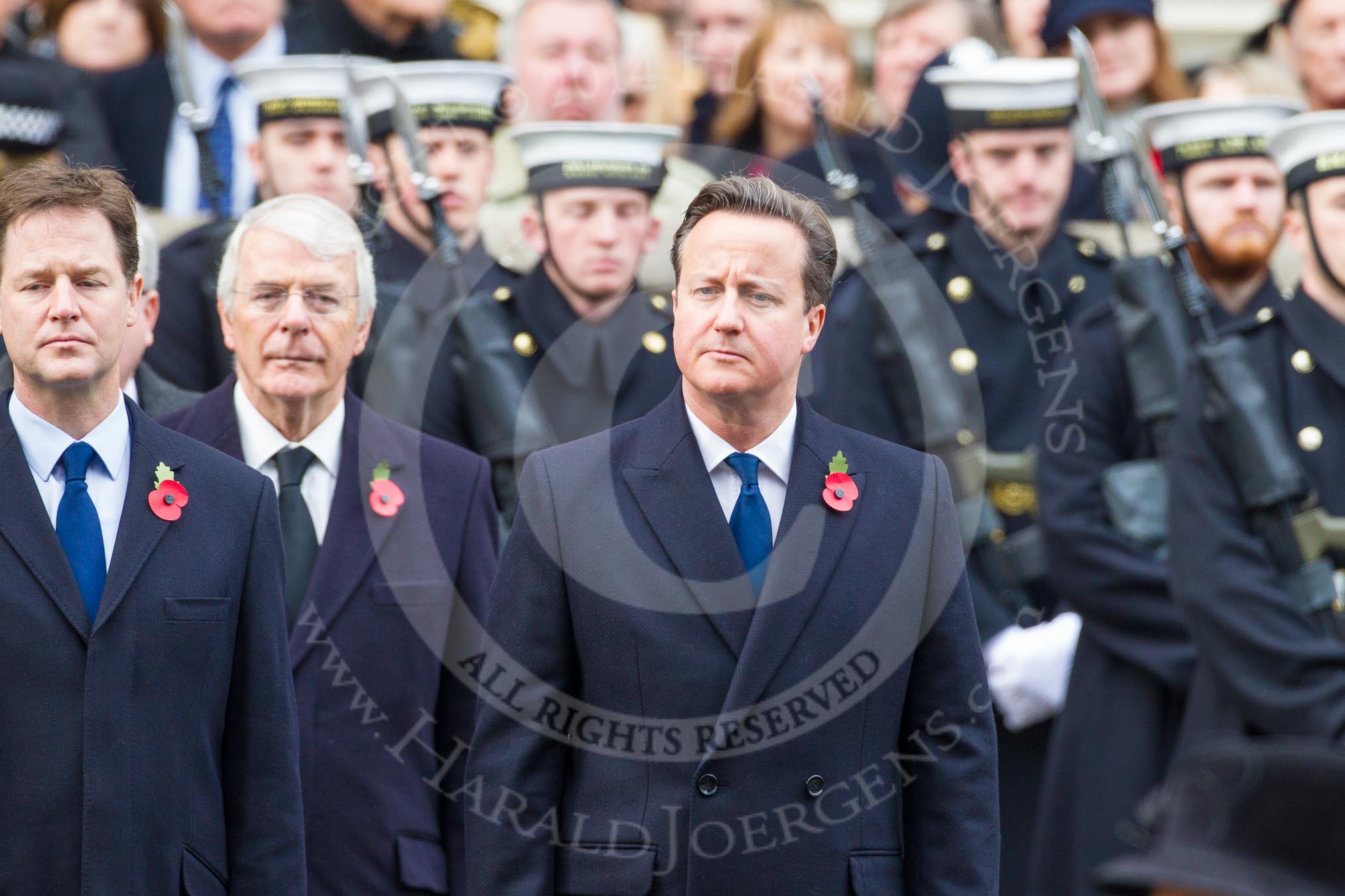 Remembrance Sunday at the Cenotaph in London 2014: The Prime Minister, David Cameron. Next to him Nick Clegg, leader of the Liberal Democrats, behind them former prime minister John Major.
Press stand opposite the Foreign Office building, Whitehall, London SW1,
London,
Greater London,
United Kingdom,
on 09 November 2014 at 11:15, image #264