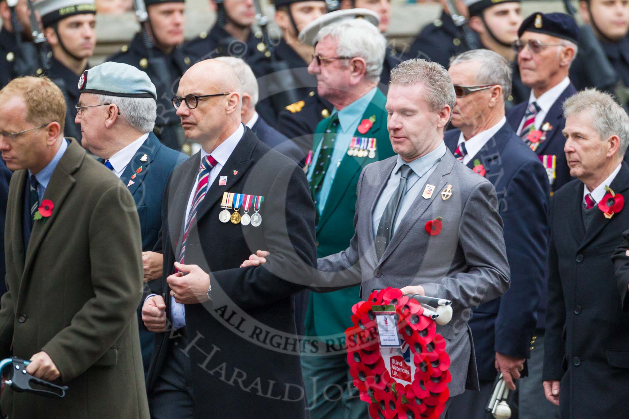 Remembrance Sunday at the Cenotaph 2015: Group F1, Blind Veterans UK.
Cenotaph, Whitehall, London SW1,
London,
Greater London,
United Kingdom,
on 08 November 2015 at 11:57, image #769