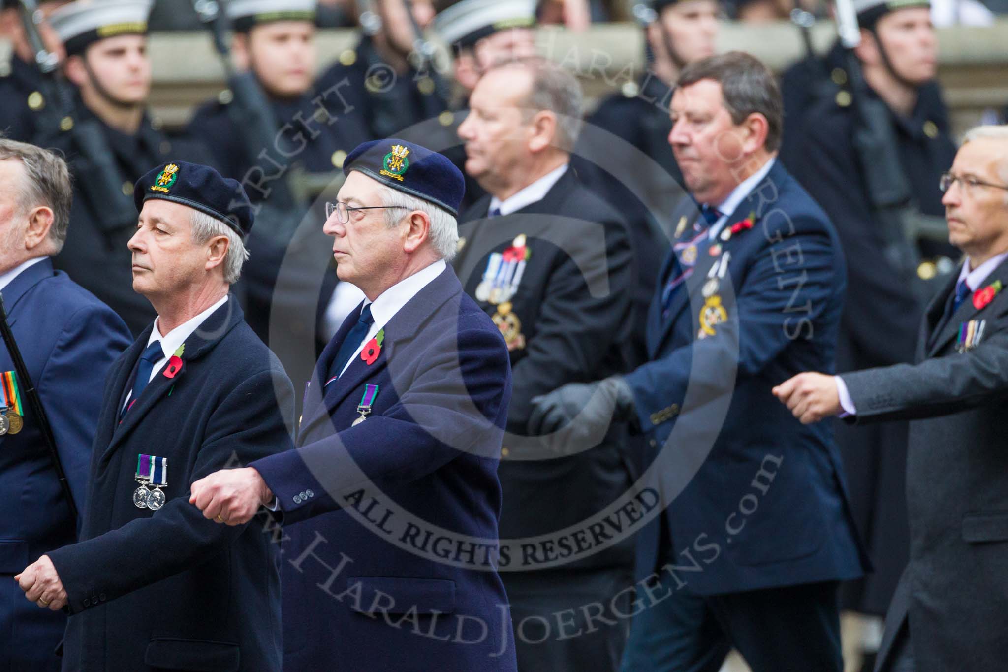 Remembrance Sunday at the Cenotaph 2015: Group E21, Royal Naval Medical Branch Ratings & Sick Berth Staff Association.
Cenotaph, Whitehall, London SW1,
London,
Greater London,
United Kingdom,
on 08 November 2015 at 12:01, image #917