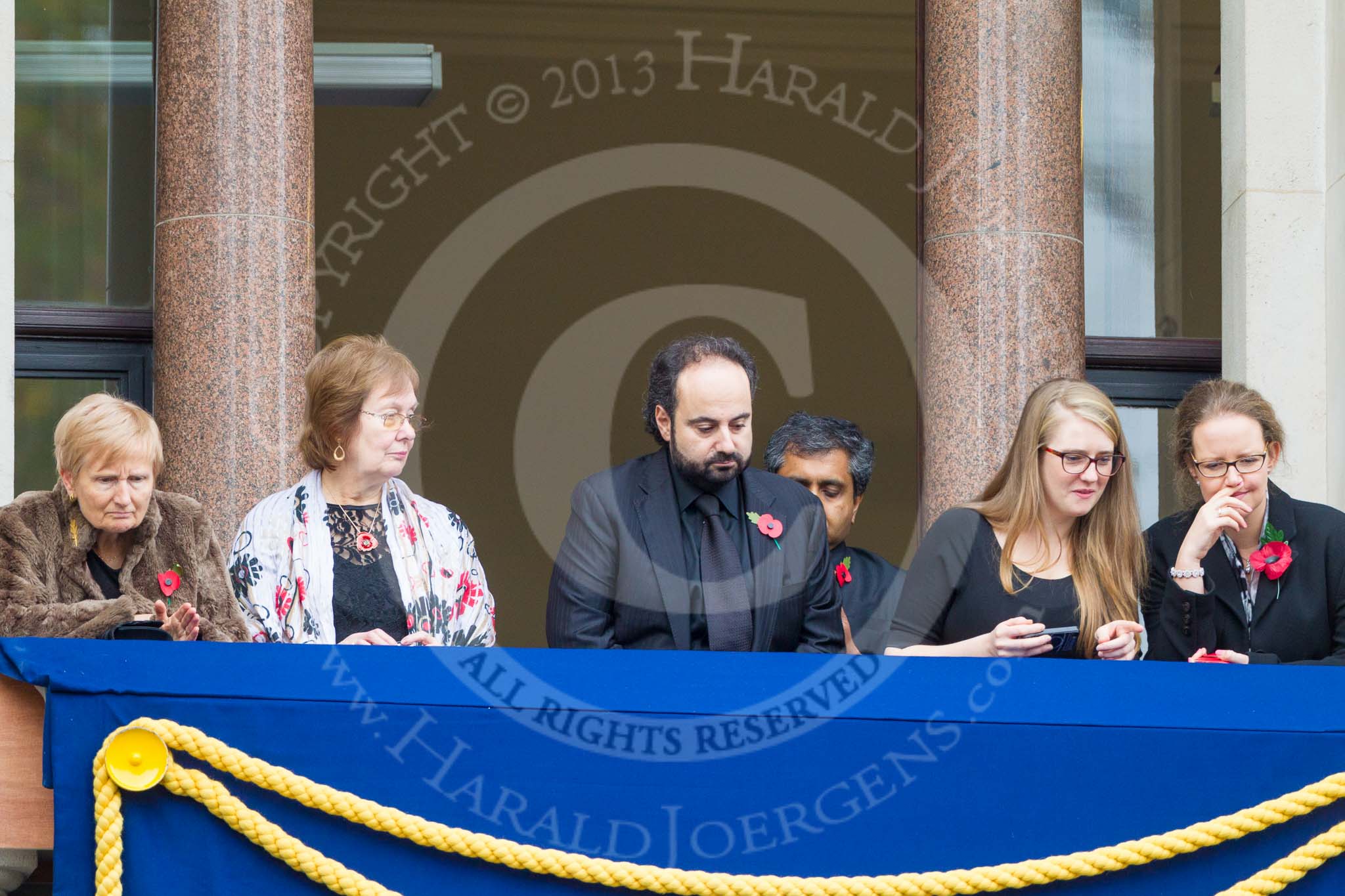 Remembrance Sunday at the Cenotaph 2015: Guests on one of the balconies of the Foreign- and Commonwealth Office Building. Image #35, 08 November 2015 10:19 Whitehall, London, UK