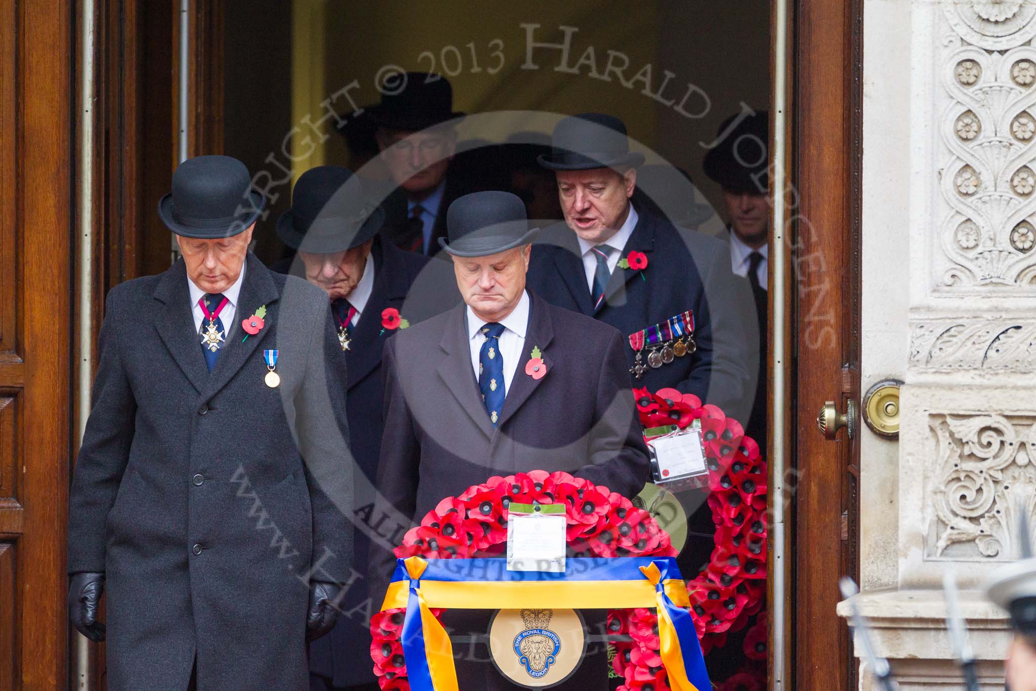 Remembrance Sunday at the Cenotaph 2015: Leading members of the Royal British Legion and other charities, on the left their president, Vice Admiral Peter Wilkinson, leaving the Foreign- and Commonwealth Office. Image #62, 08 November 2015 10:40 Whitehall, London, UK