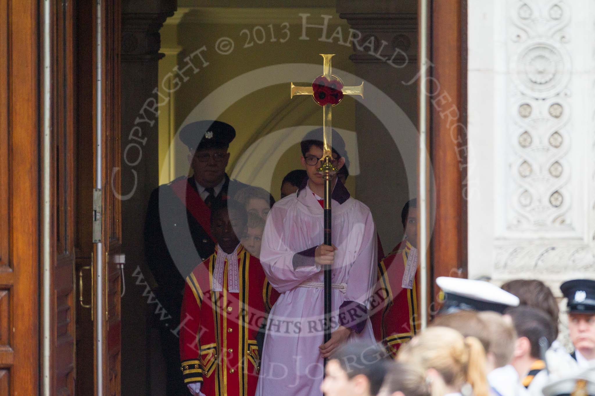 Remembrance Sunday at the Cenotaph 2015: The choir, led by the Cross Bearer, Jason Panagiotopoulos, is emerging from the Foreign- and Commonwealth Office Building, followed by the 10 Children of the Chapel Royal. Image #72, 08 November 2015 10:51 Whitehall, London, UK