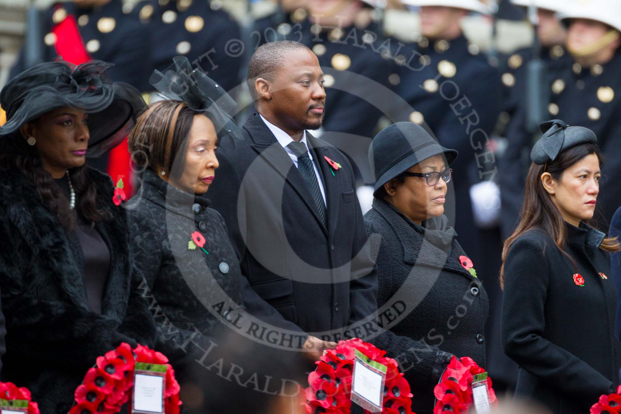 Remembrance Sunday at the Cenotaph 2015: The Deputy High Commissioner of Barbados, the High Commissioner of Lesotho, the Charge D’Affaires  of Botswana, the Acting High Commissioner of Guyana and the High Commissioner of Singapore, Ms FOO Chi Hsia, with their wreaths at the Cenotaph. Image #119, 08 November 2015 10:57 Whitehall, London, UK