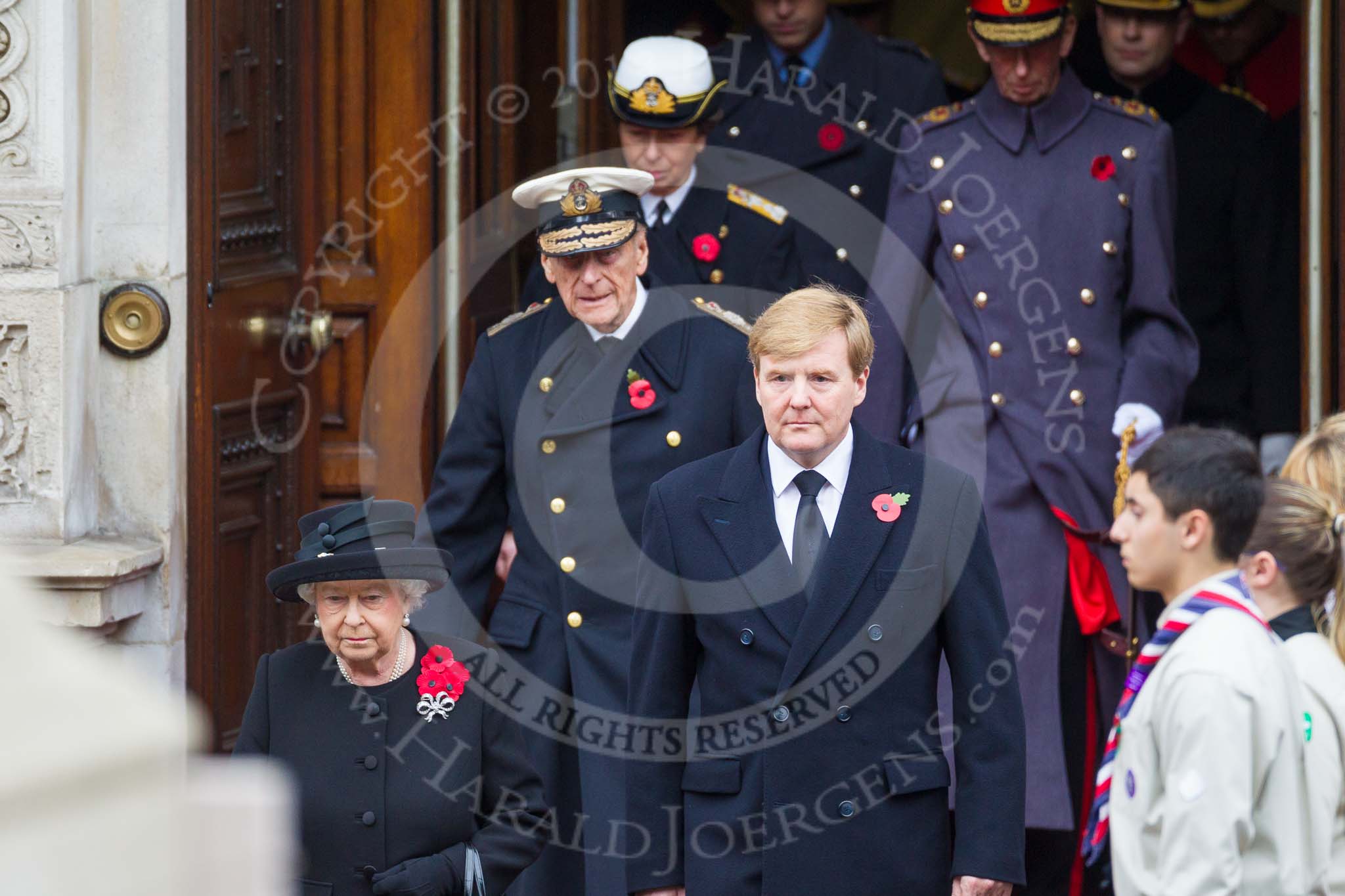 Remembrance Sunday at the Cenotaph 2015: HM The Queen, with  HM King Willem-Alexander of the Netherlands, followed by the other members of the Royal Family, leaving the Foreign- and Commonwealth Office. Image #127, 08 November 2015 10:58 Whitehall, London, UK