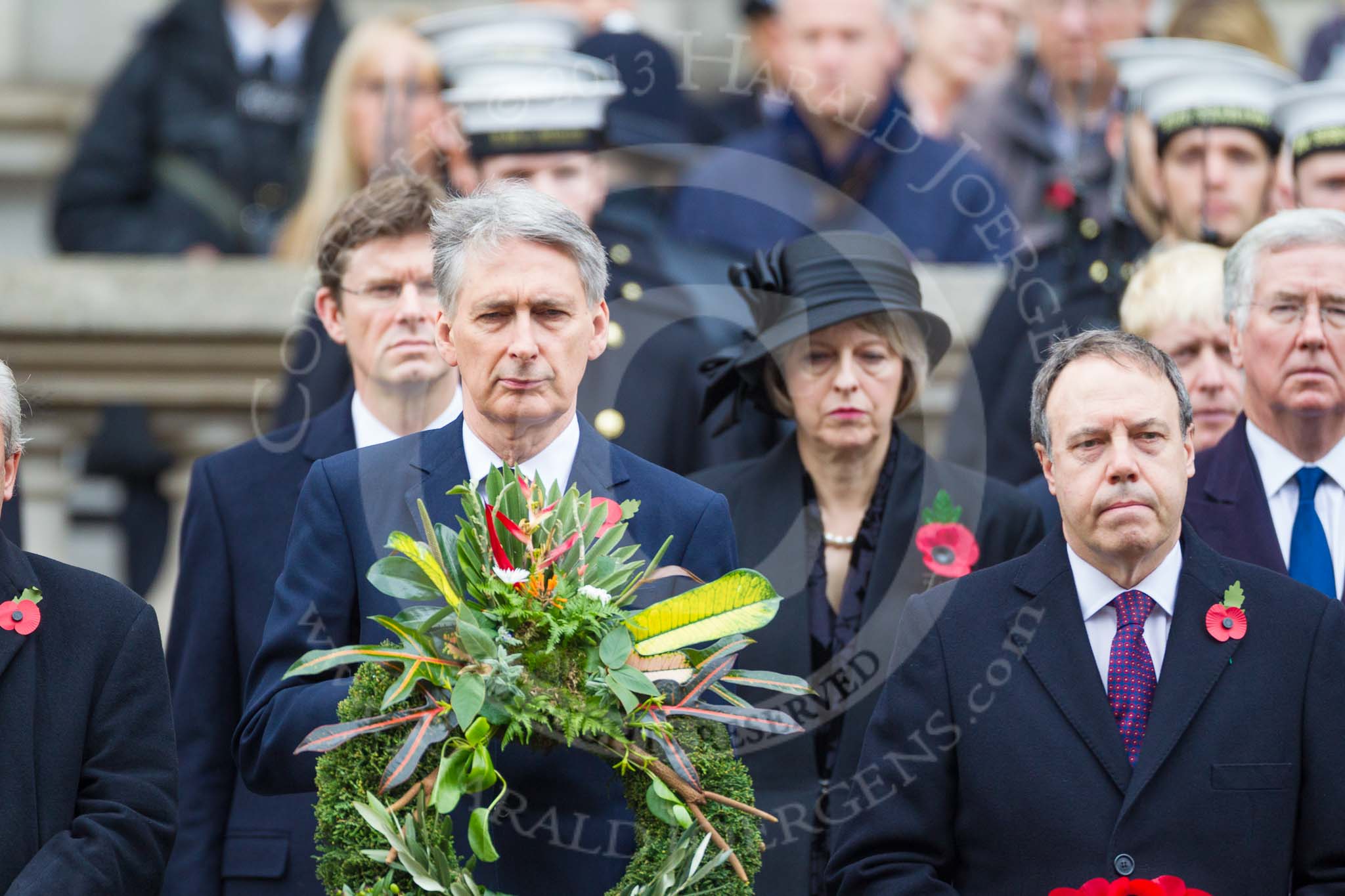 Remembrance Sunday at the Cenotaph 2015: The Secretary of State for Foreign and Commonwealth Affairs, the Rt Hon Philip Hammond MP, the Rt Hon Nigel Dodds MP. Image #152, 08 November 2015 11:02 Whitehall, London, UK