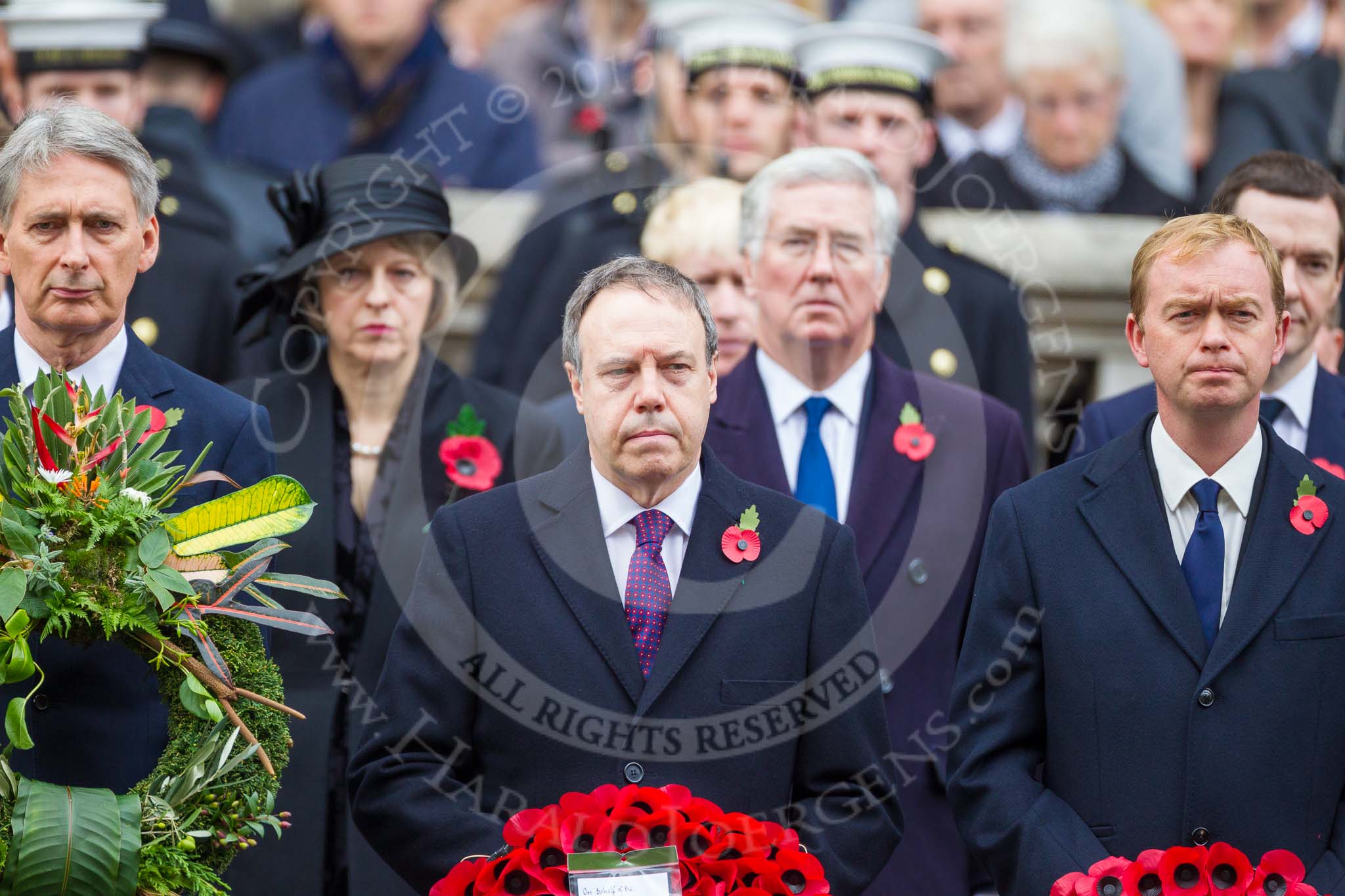 Remembrance Sunday at the Cenotaph 2015: The Secretary of State for Foreign and Commonwealth Affairs, Philip Hammond, the Westminster Democratic Unionist Party Leader, Nigel Dodds, and The Leader of the Liberal Democrats, Tim Fallon. Image #154, 08 November 2015 11:02 Whitehall, London, UK