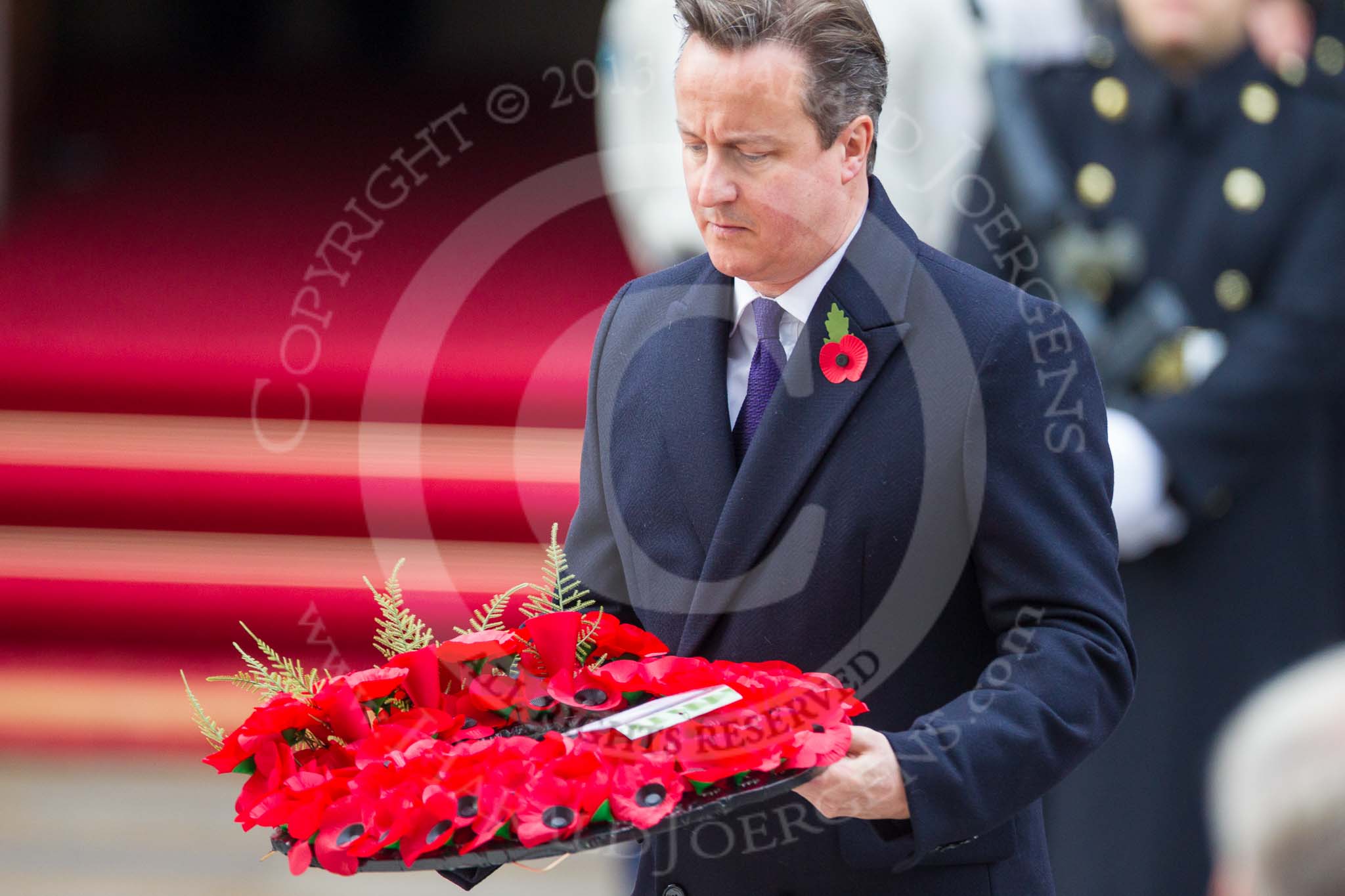 Remembrance Sunday at the Cenotaph 2015: The Prime Minister, David Cameron, about to lay his wreath at the Cenotaph. Image #205, 08 November 2015 11:06 Whitehall, London, UK