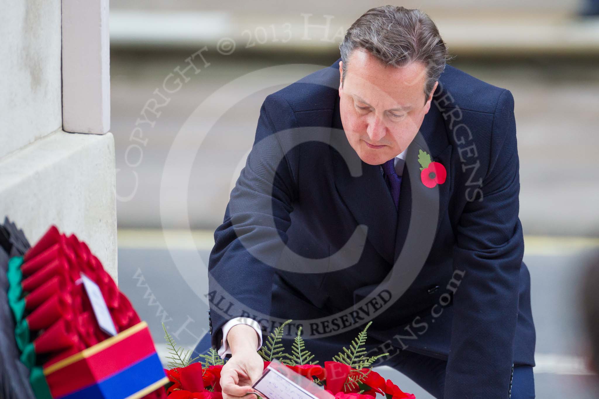 Remembrance Sunday at the Cenotaph 2015: The Prime Minister, David Cameron, laying his wreath at the Cenotaph. Image #207, 08 November 2015 11:06 Whitehall, London, UK