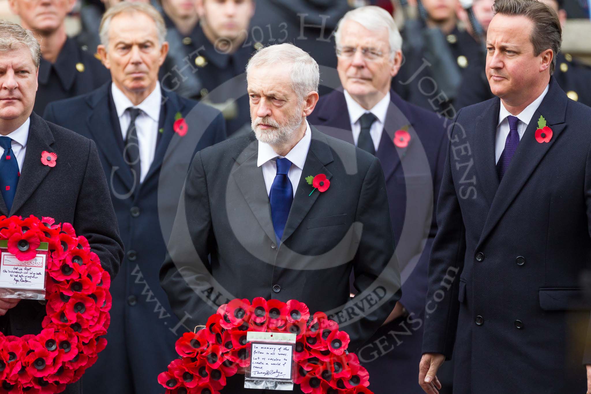 Remembrance Sunday at the Cenotaph 2015: The leader of the opposition, Jeremy Corbyn, starts walking towards the Cenotaph with his wreath. Image #211, 08 November 2015 11:06 Whitehall, London, UK