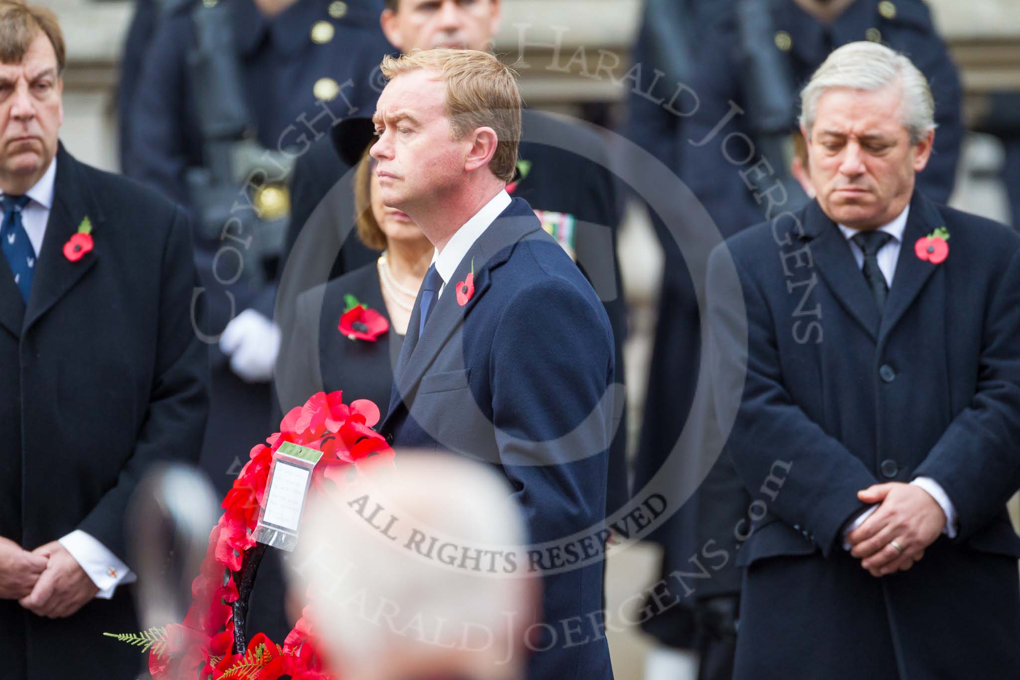 Remembrance Sunday at the Cenotaph 2015: The Leader of the Liberal Democrats, Tim Fallon, walking towards the Cenotaph with his wreath. Image #216, 08 November 2015 11:07 Whitehall, London, UK