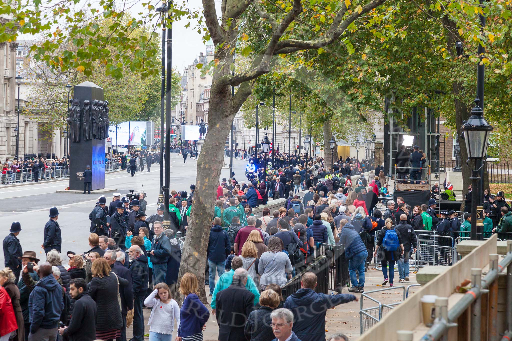 Remembrance Sunday at the Cenotaph 2015: Whitehall after the event. The barriers are still in place as there are other groups groups coming to lay their wreaths. Image #383, 08 November 2015 13:05 Whitehall, London, UK